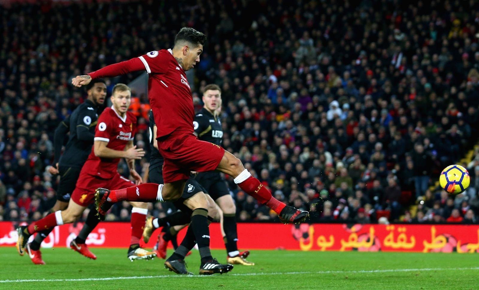 Liverpool crush hapless Swansea to stay fourth