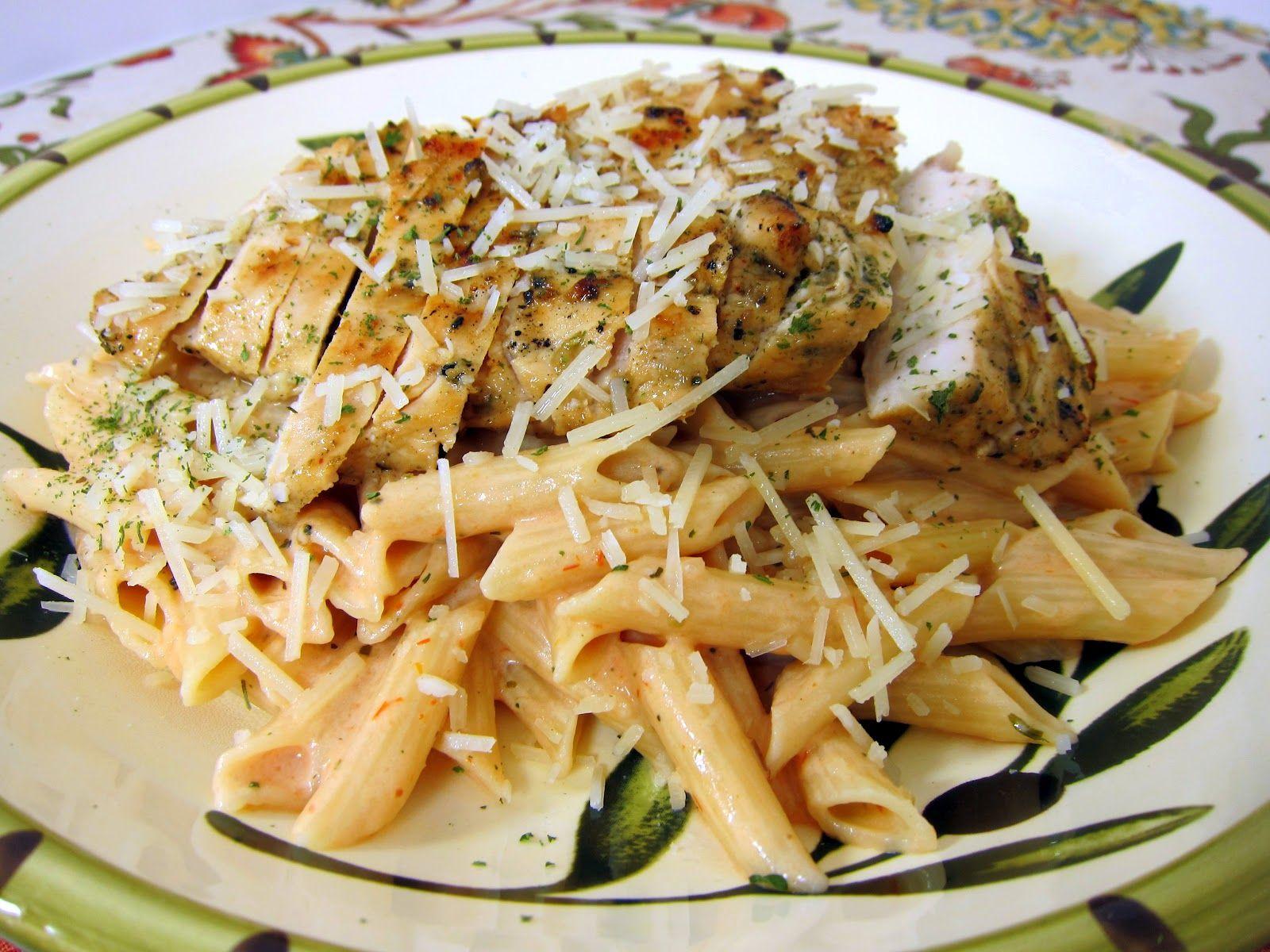 Grilled Chicken over Tomato Alfredo Sauce