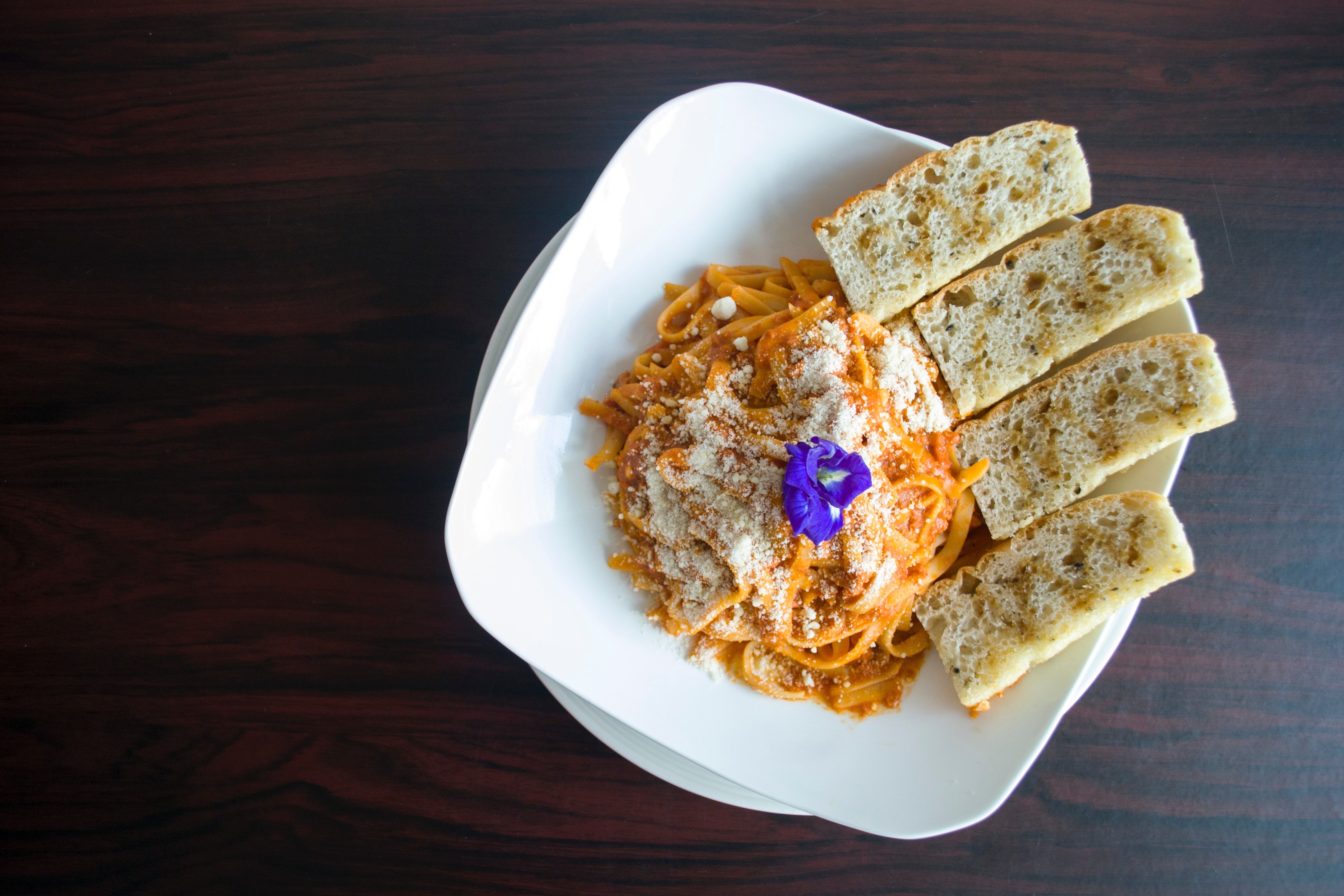 Photography of Pasta with Garlic Bread · Free