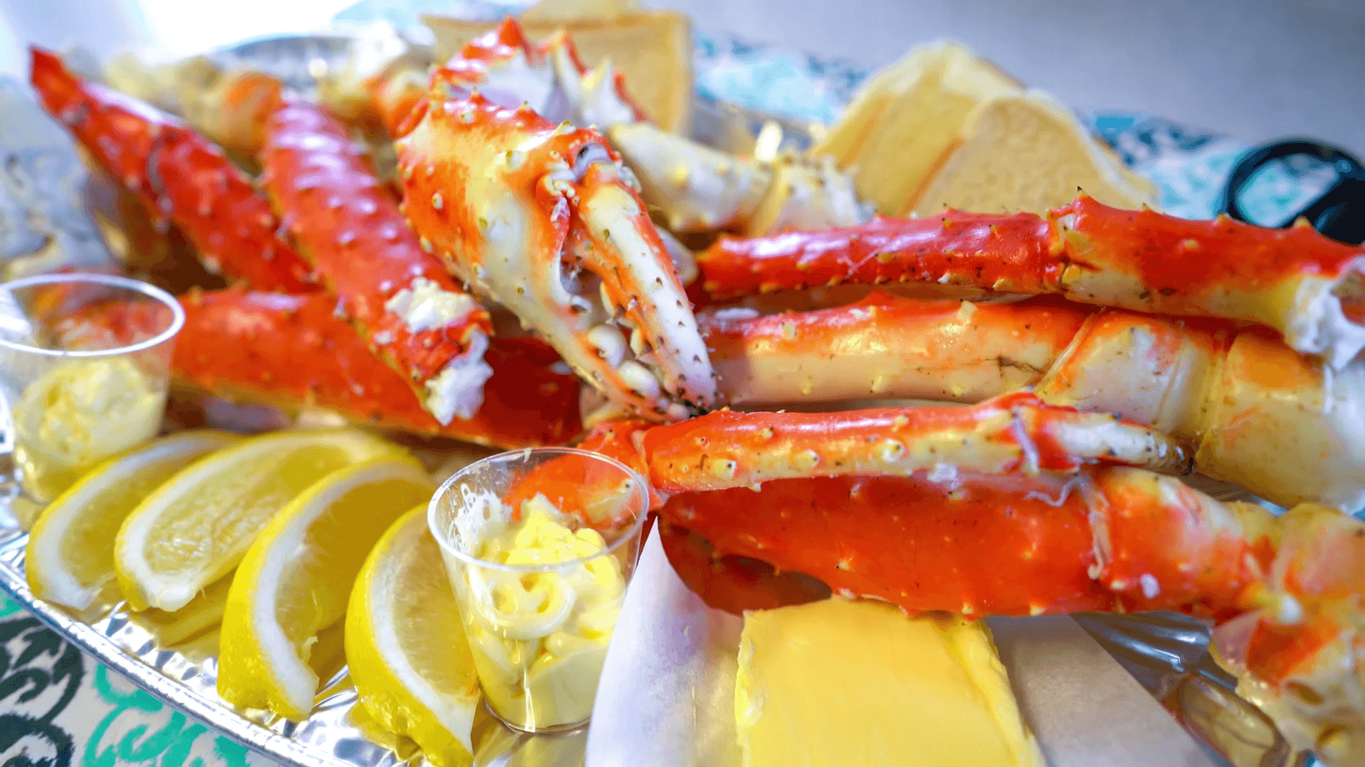 Red king crab legs with fresh lemon slices. Delicious seafood