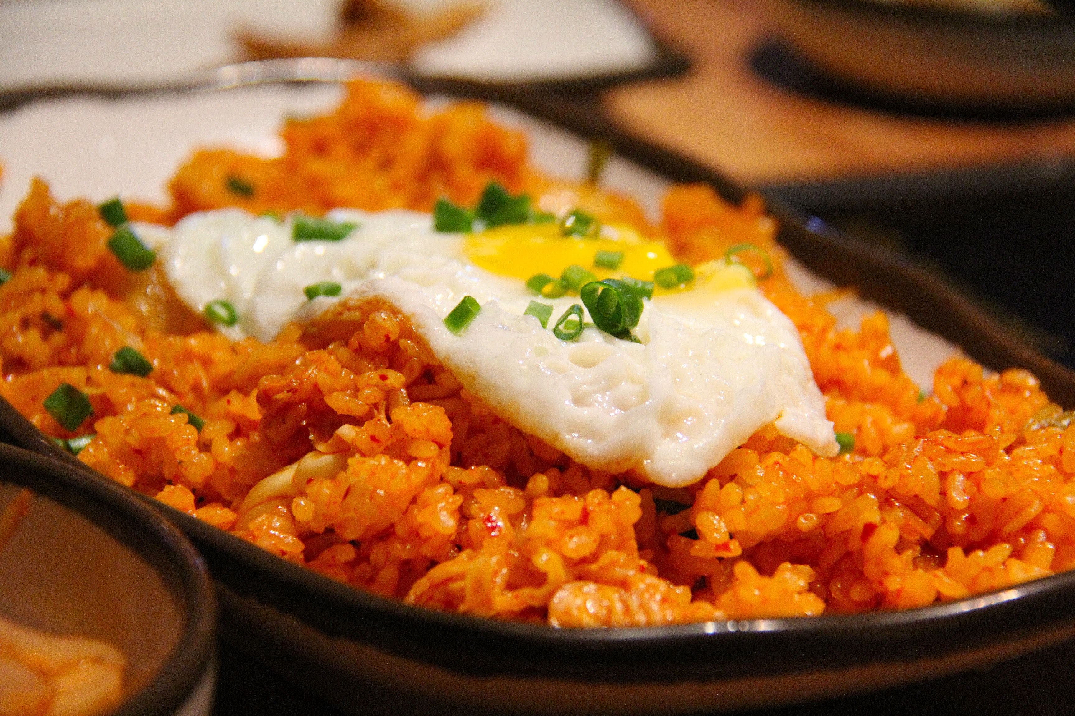 White and Yellow Sunny Side Up Egg on Fried Rice · Free