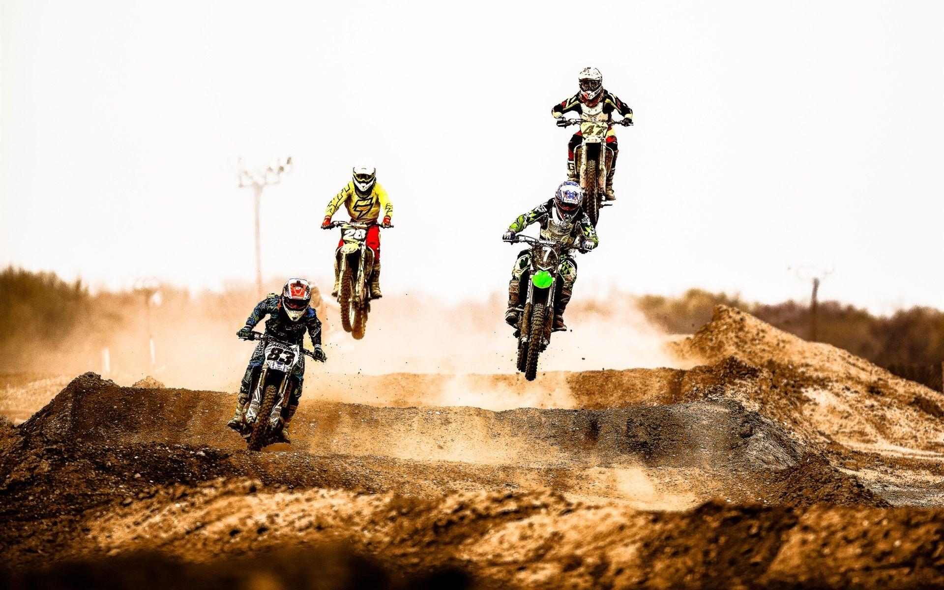 Motocross race, jump, dust, desert wallpaper. bikes and motorcycles