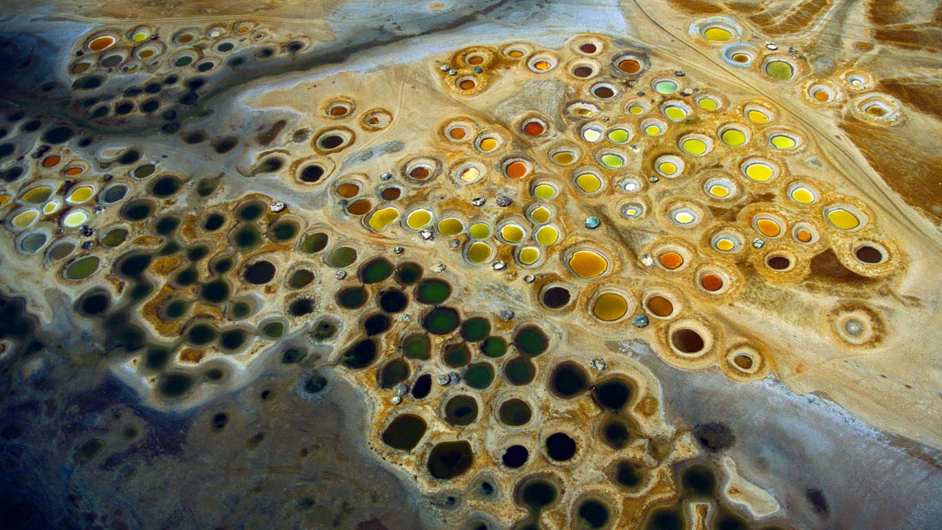 Colorful salt pits in the Saloum Delta of Senegal wallpaper