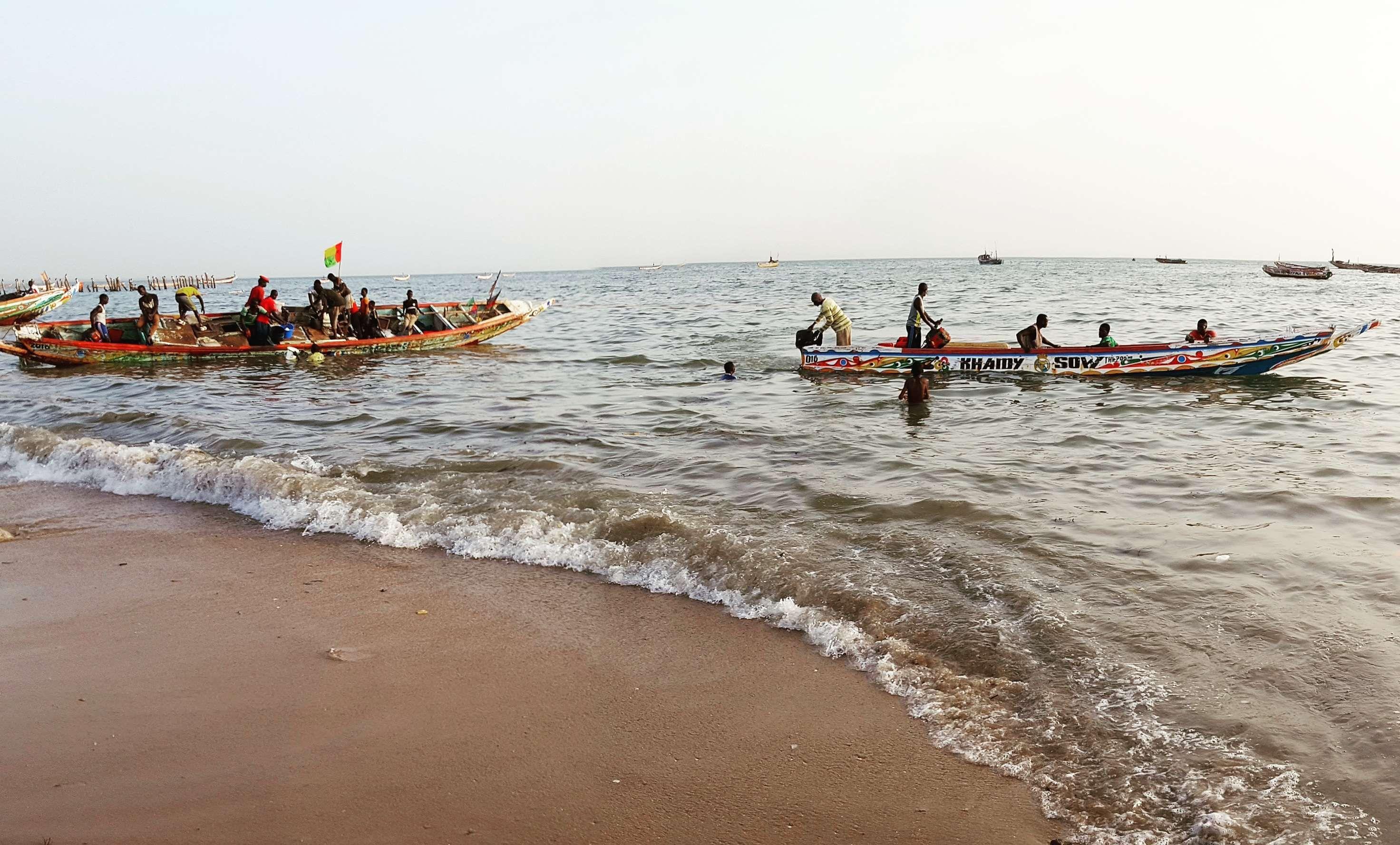 africa #beach #canoe #fish #fisherman #fishing #harbor #ocean