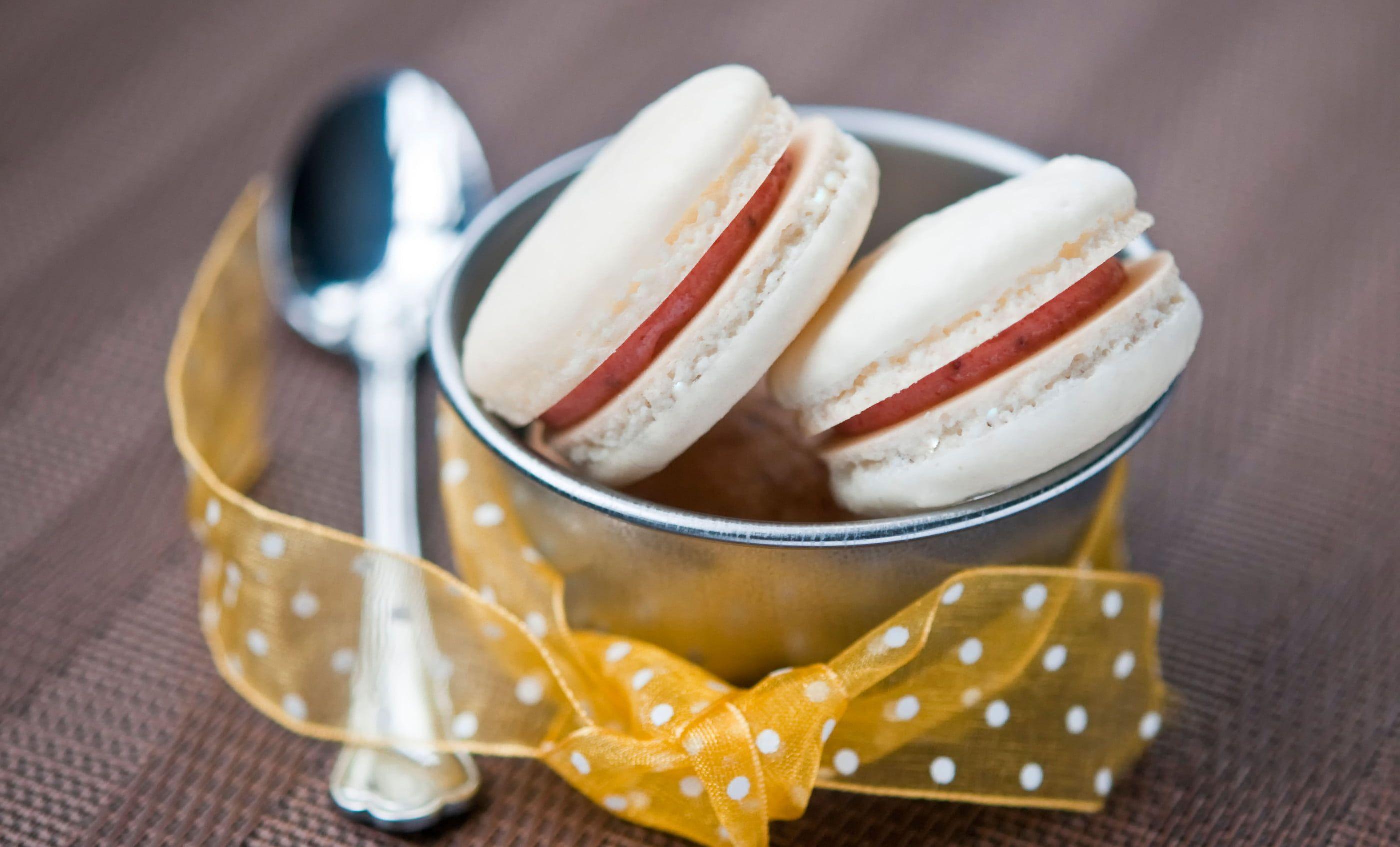 Two white macarons in stainless steel bowl HD wallpaper. Wallpaper