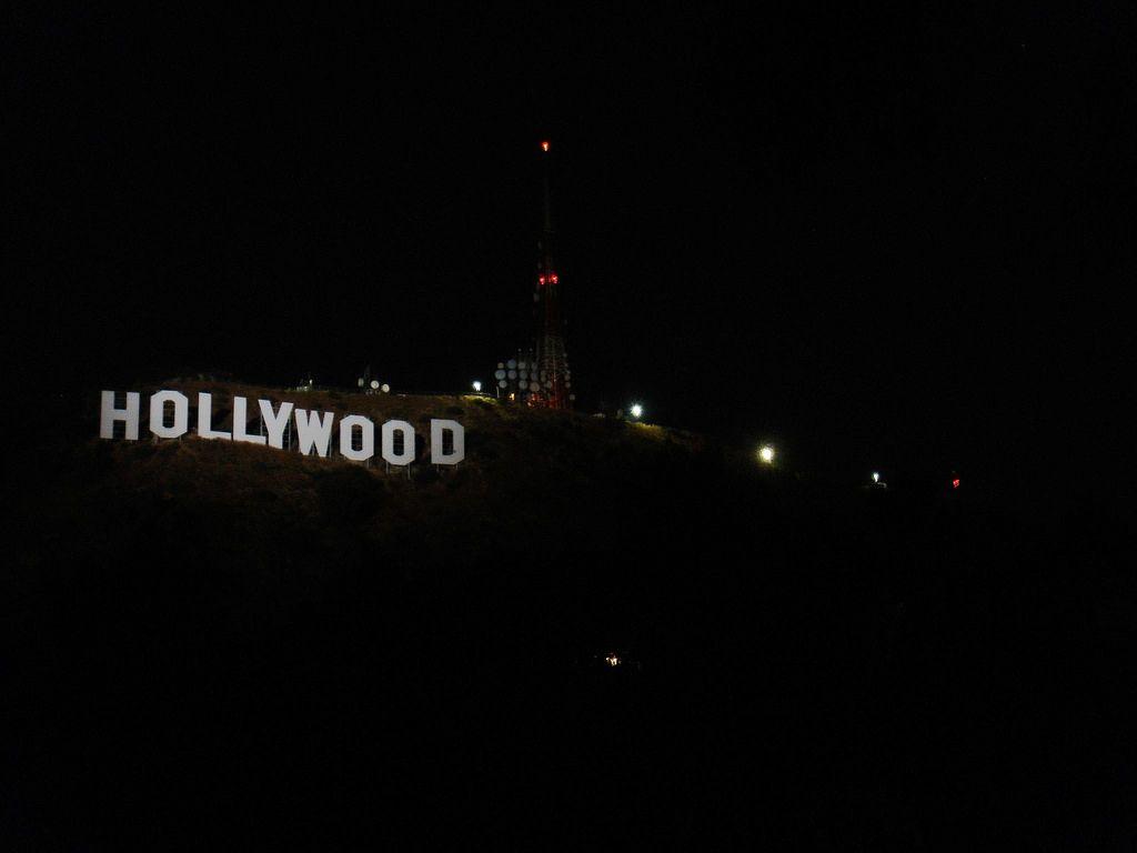 a RARE photo of the Hollywood Sign lit up at night