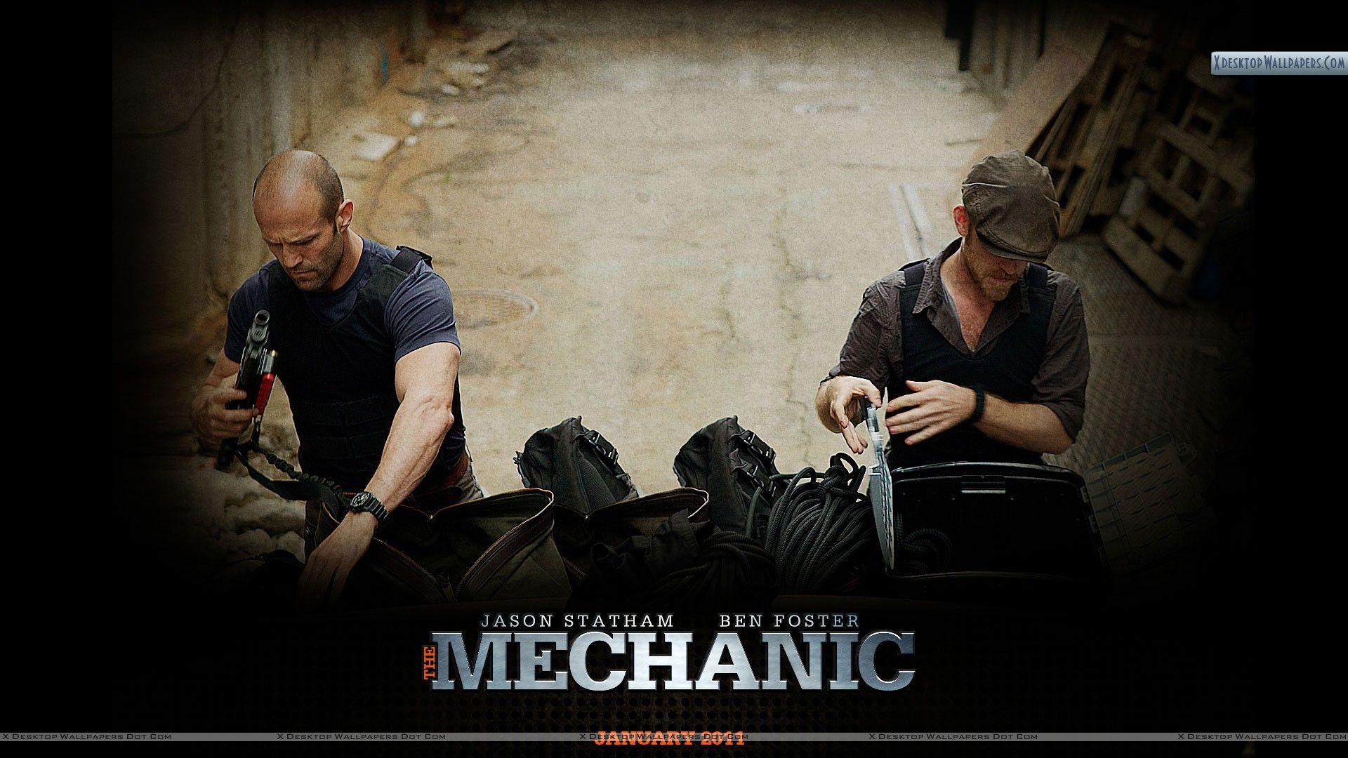 Jason Statham & Ben Foster Checking Their Tools Wallpaper