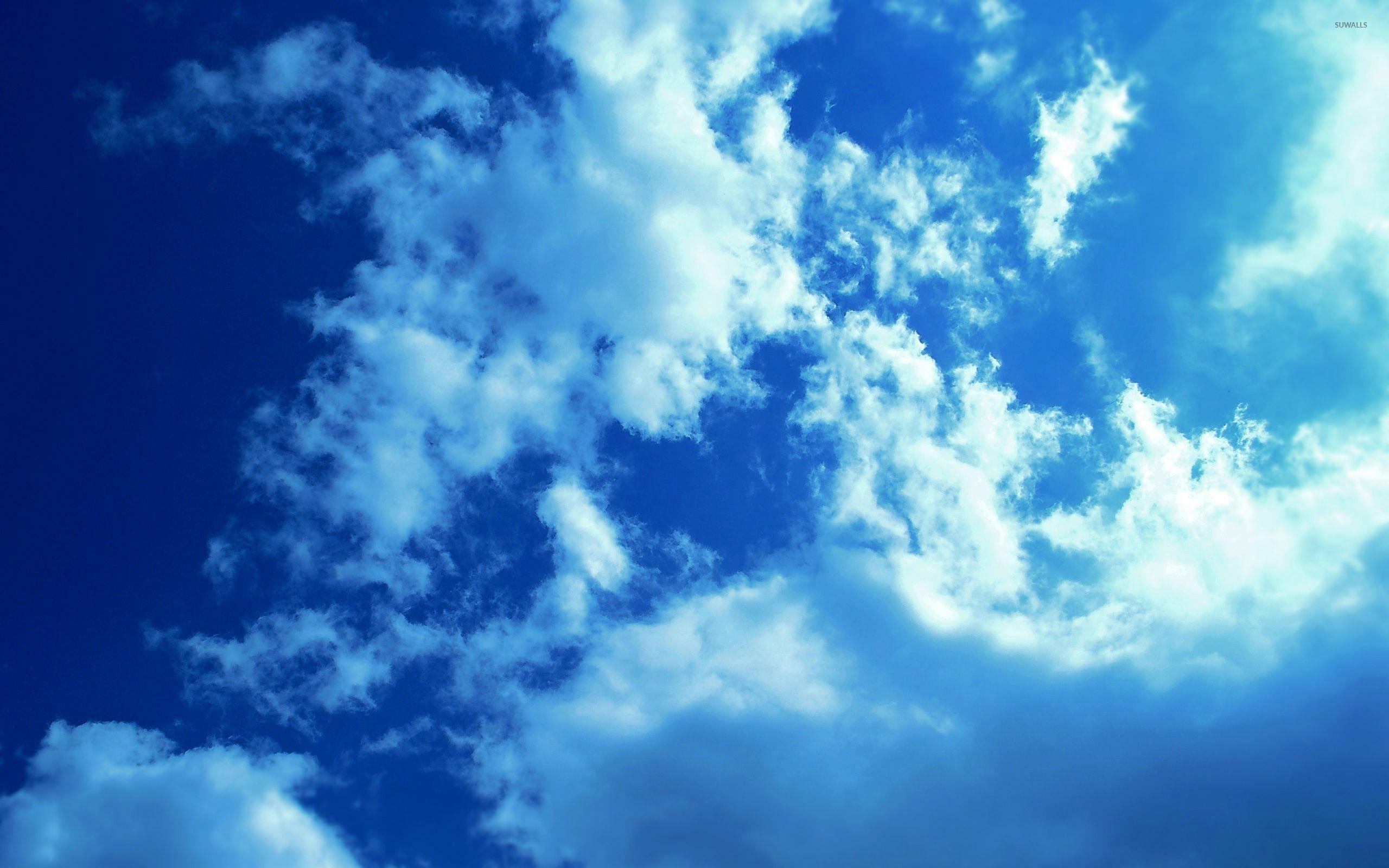 White clouds and blue sky wallpaper .suwalls.com