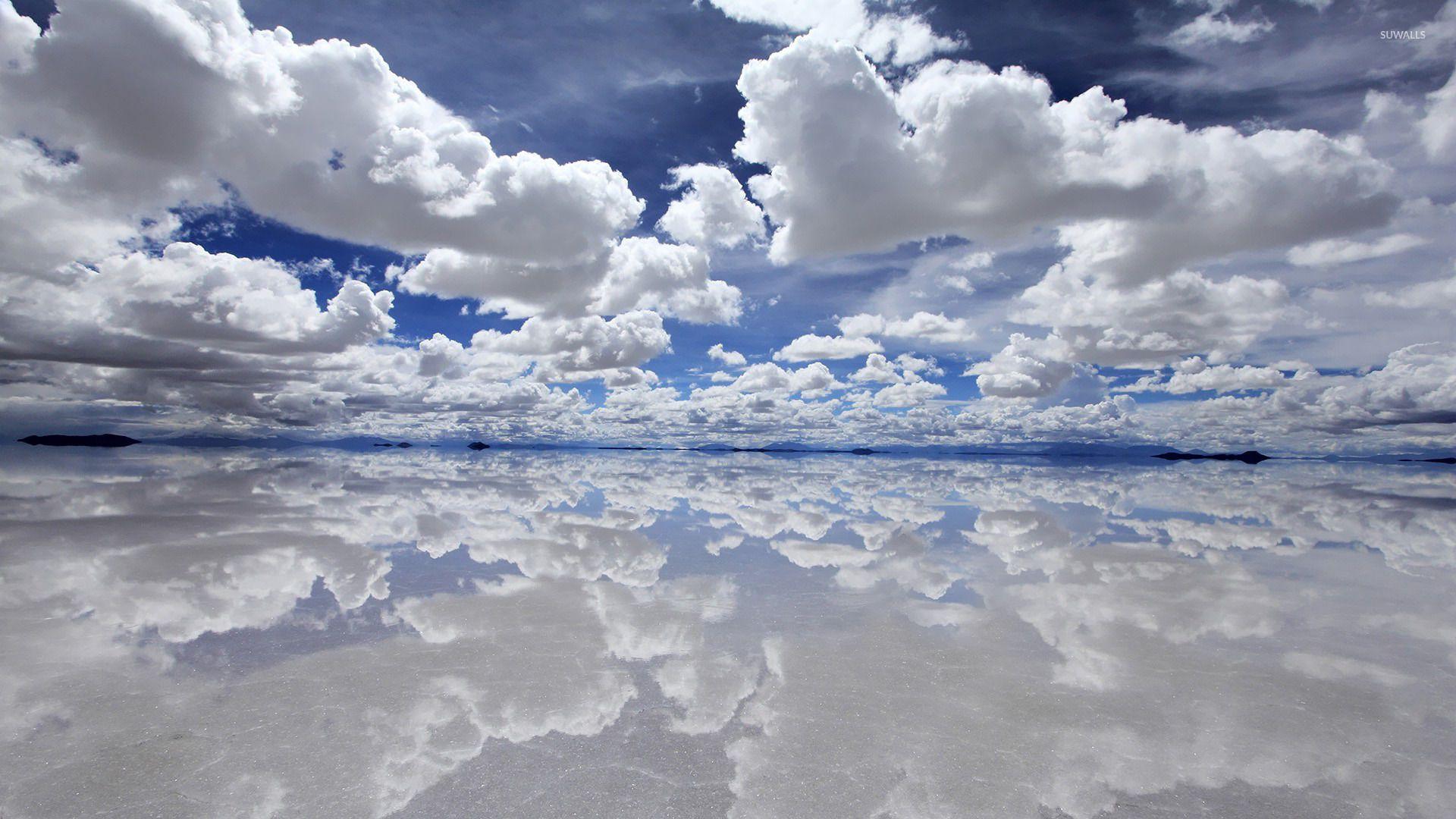 Cloud reflections in water wallpaper wallpaper