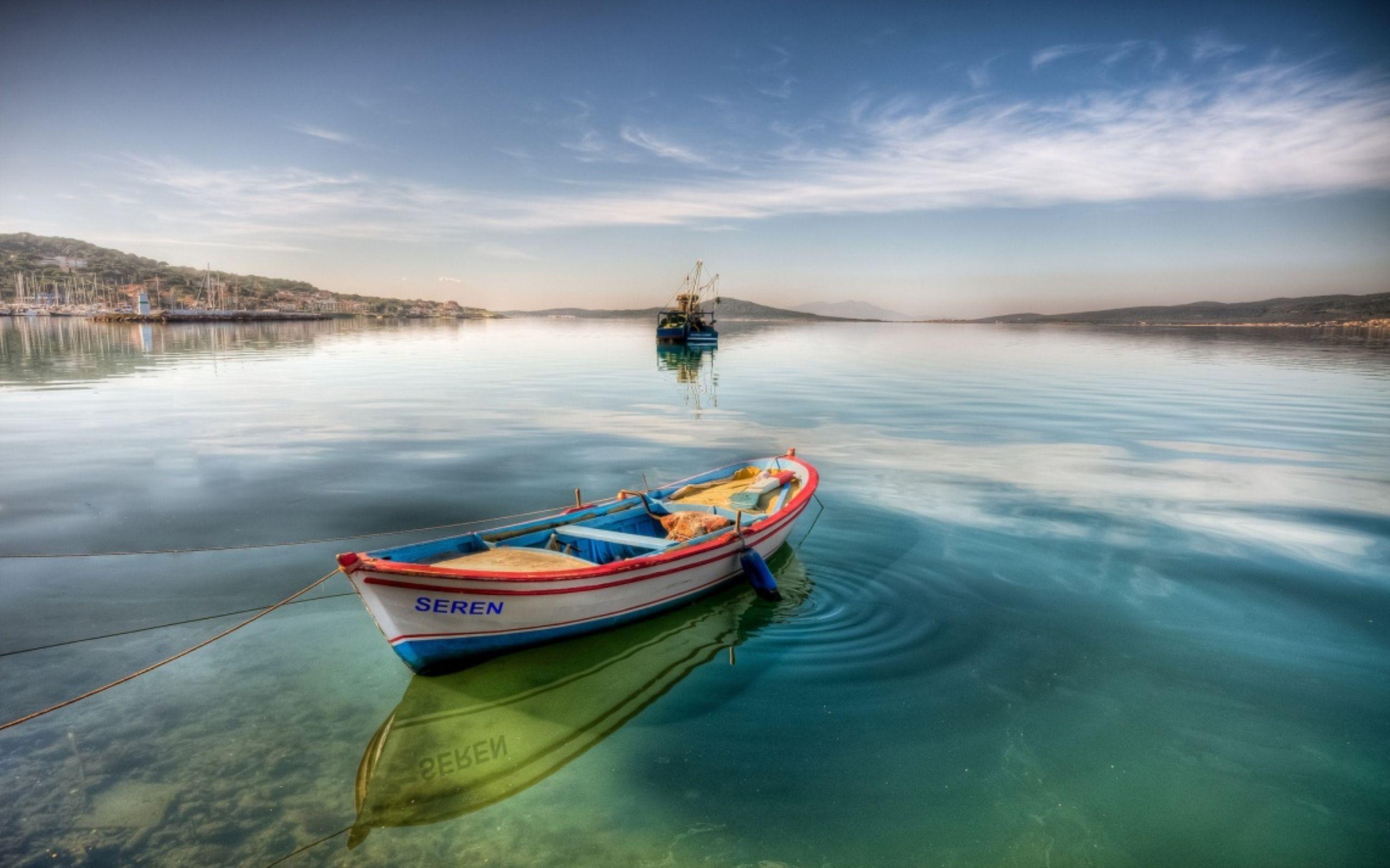 Colorful Boat In Water Reflection