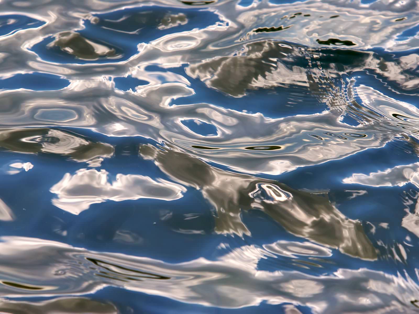 Silver Water Reflection Patterns Water Background Wallpaper