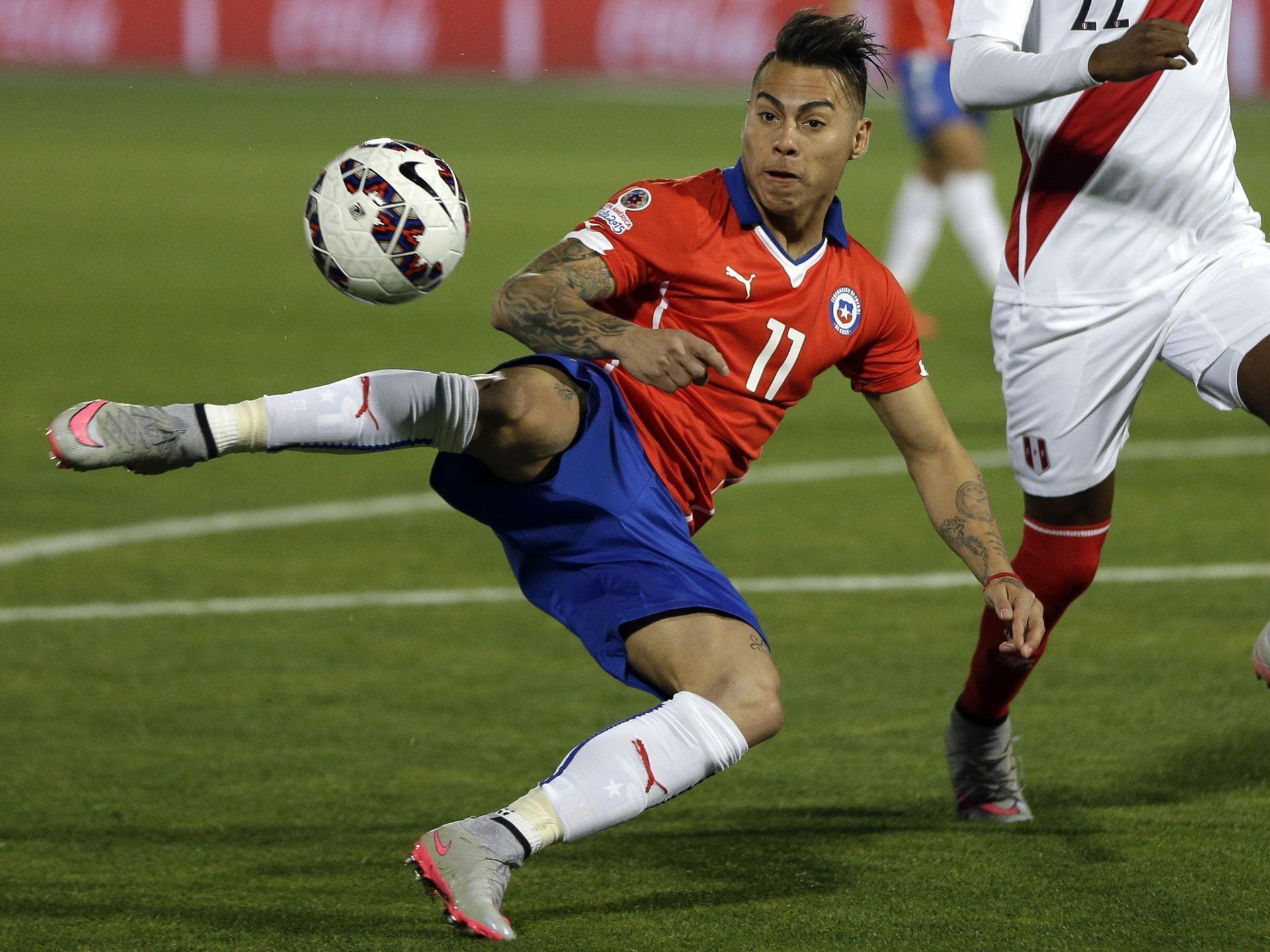 Chile's Eduardo Vargas makes a kick during a Copa America semifinal