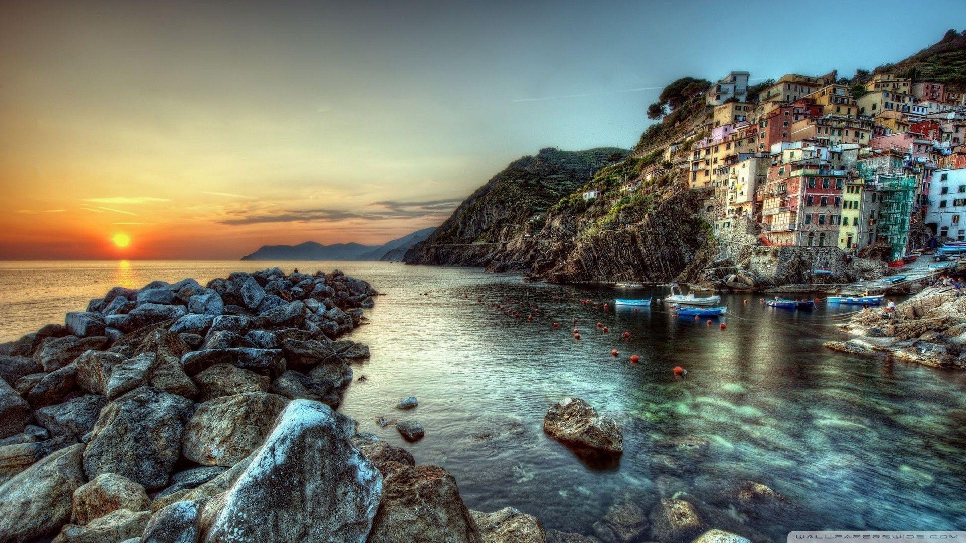 Seashore at sunset, the resort Cinque Terre in Italy wallpaper
