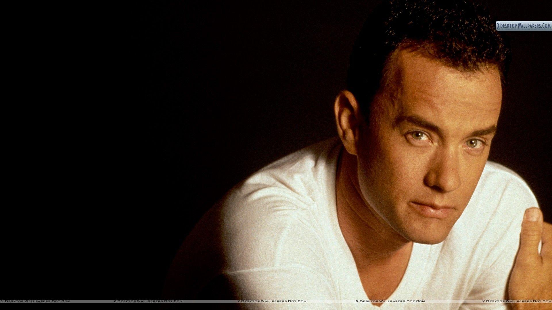 Tom Hanks In White T Shirt & Black Background Wallpaper
