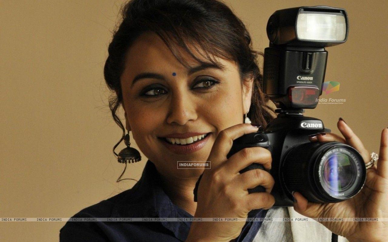 Wallpaper Mukherjee poses with a Camera on World Photography
