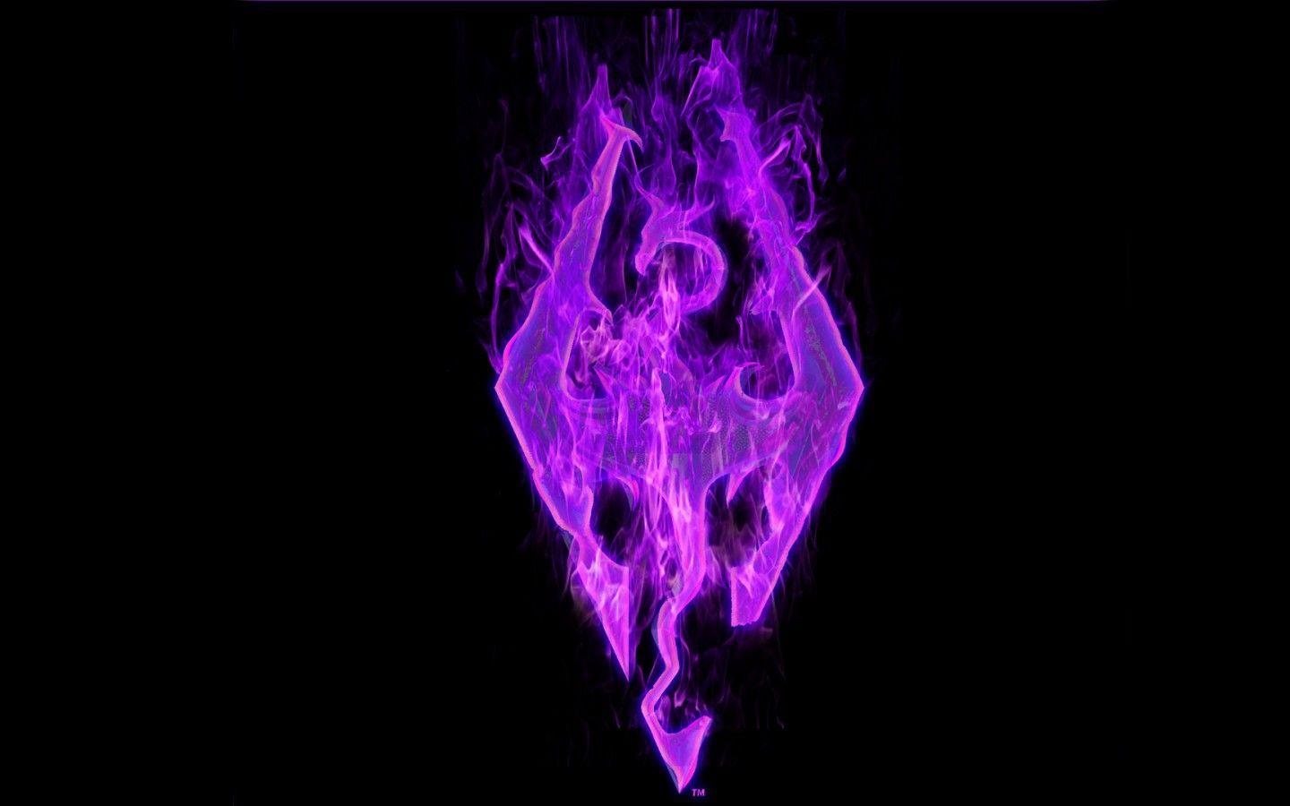 The Skyrim logo on fire with purple flames. Cool