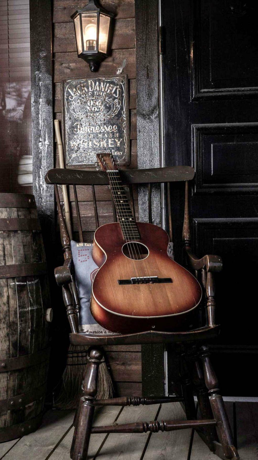 Old Guitar On Chair #iPhone #wallpaper. iPhone 6 8 Wallpaper