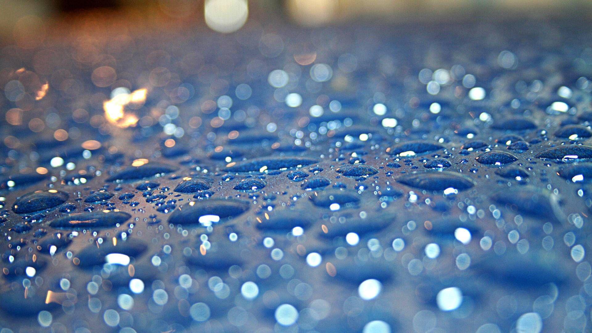 Sparkling Blue Rain Drops wallpaper