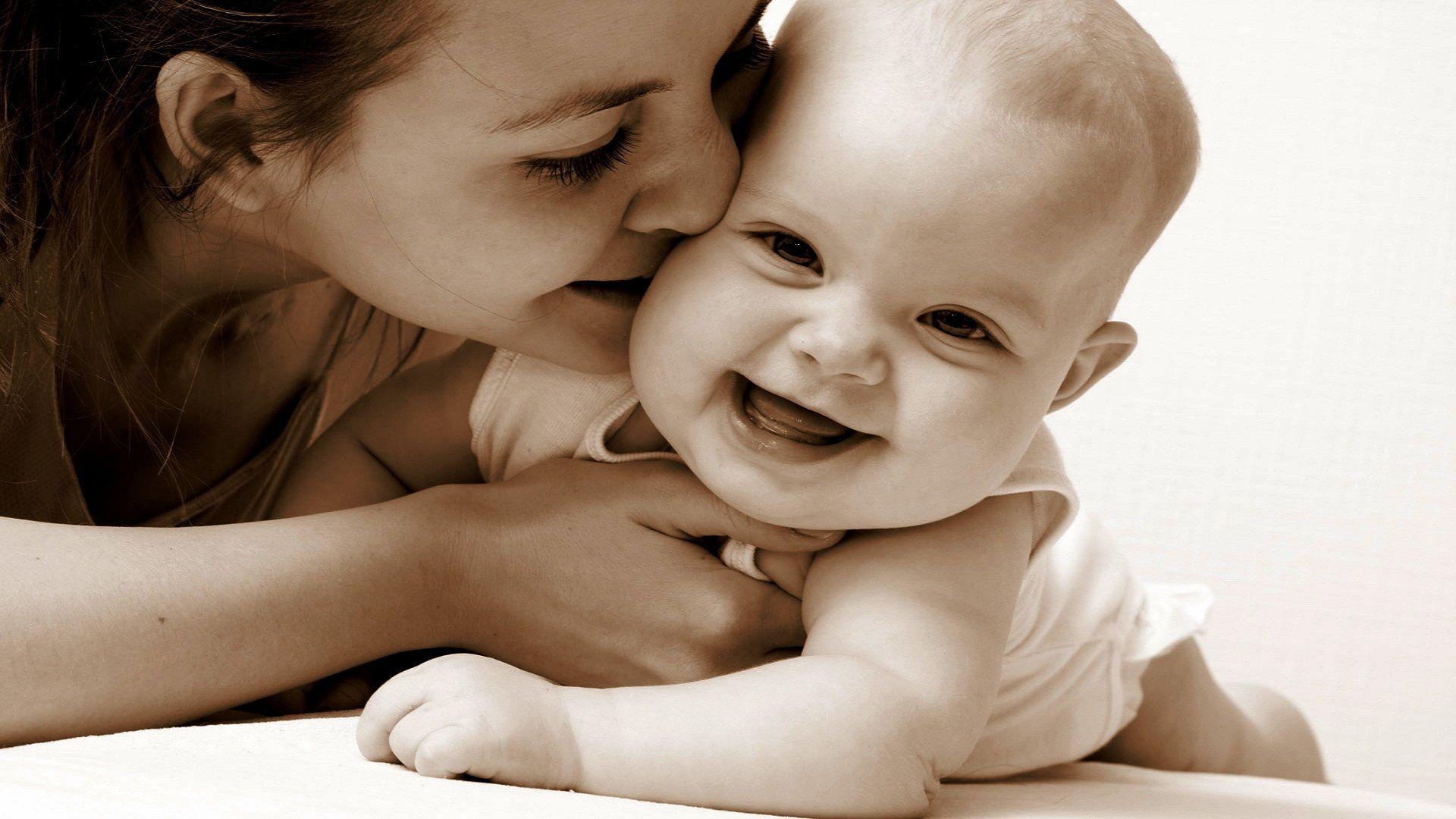 Cute baby smile mother kiss wide wallpaper. HD Wallpaper Rocks