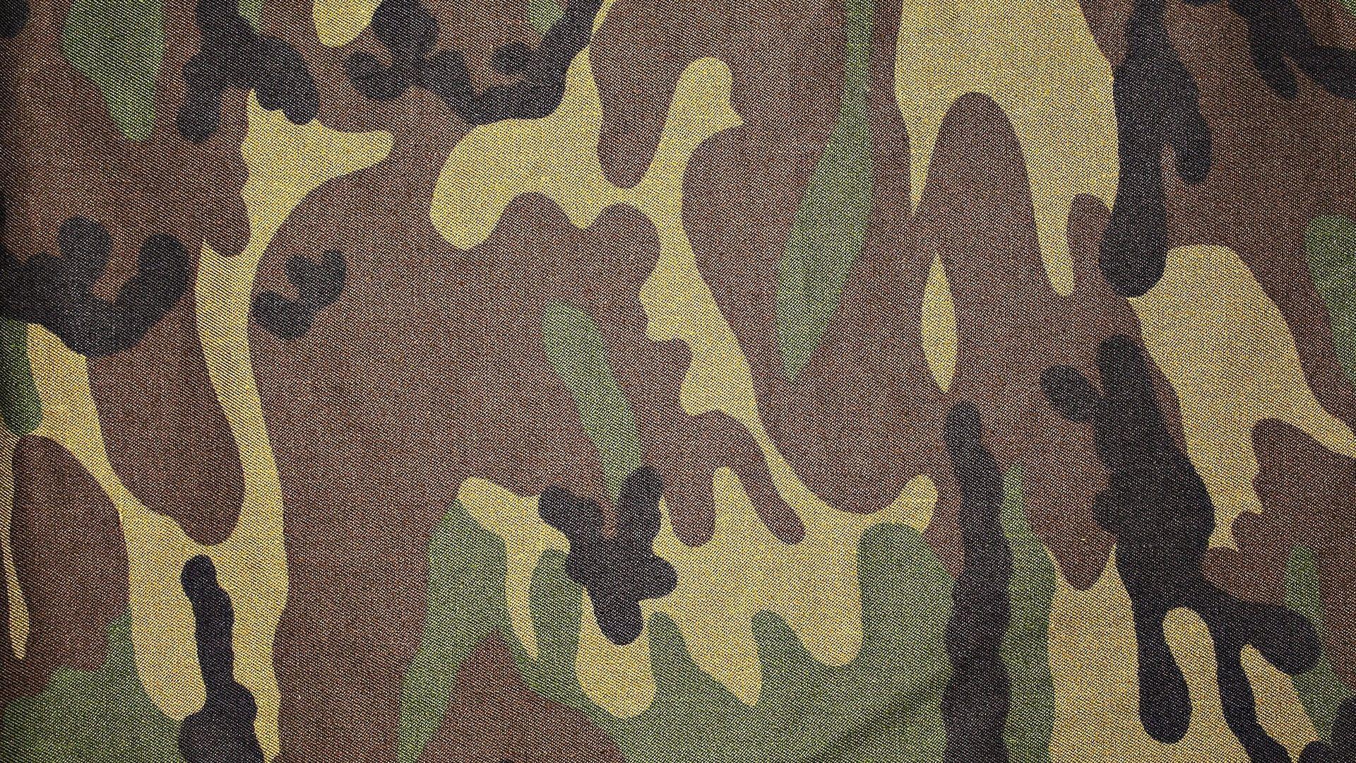 Closeup photo of brown and multicolored woodland camo textile HD