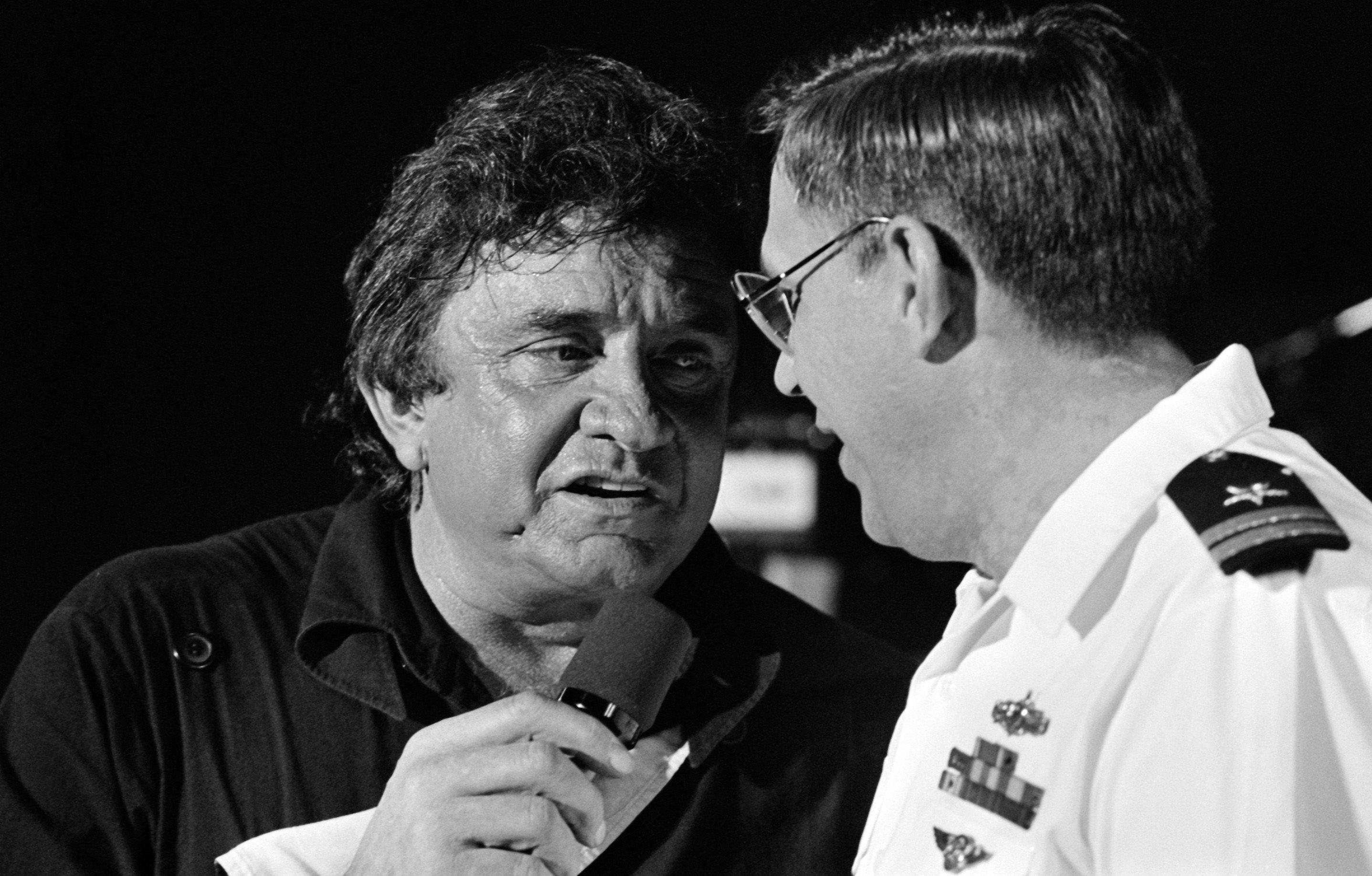 Johnny Cash sings a duet with a Navy