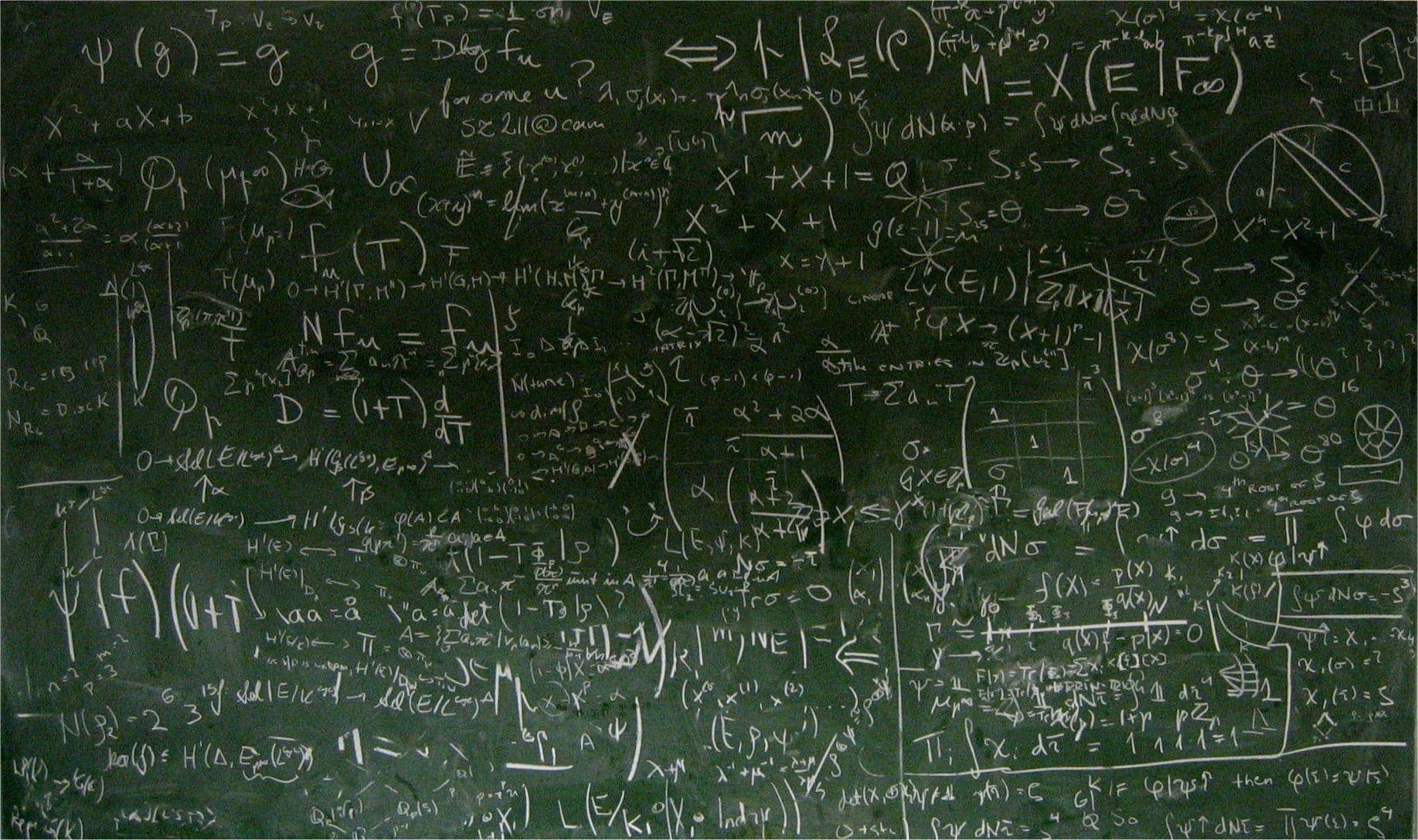 Mathematical equations written on chalk board HD wallpaper