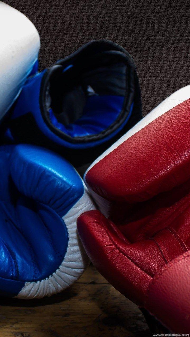 Premium Photo  Boxing gloves on the dark background