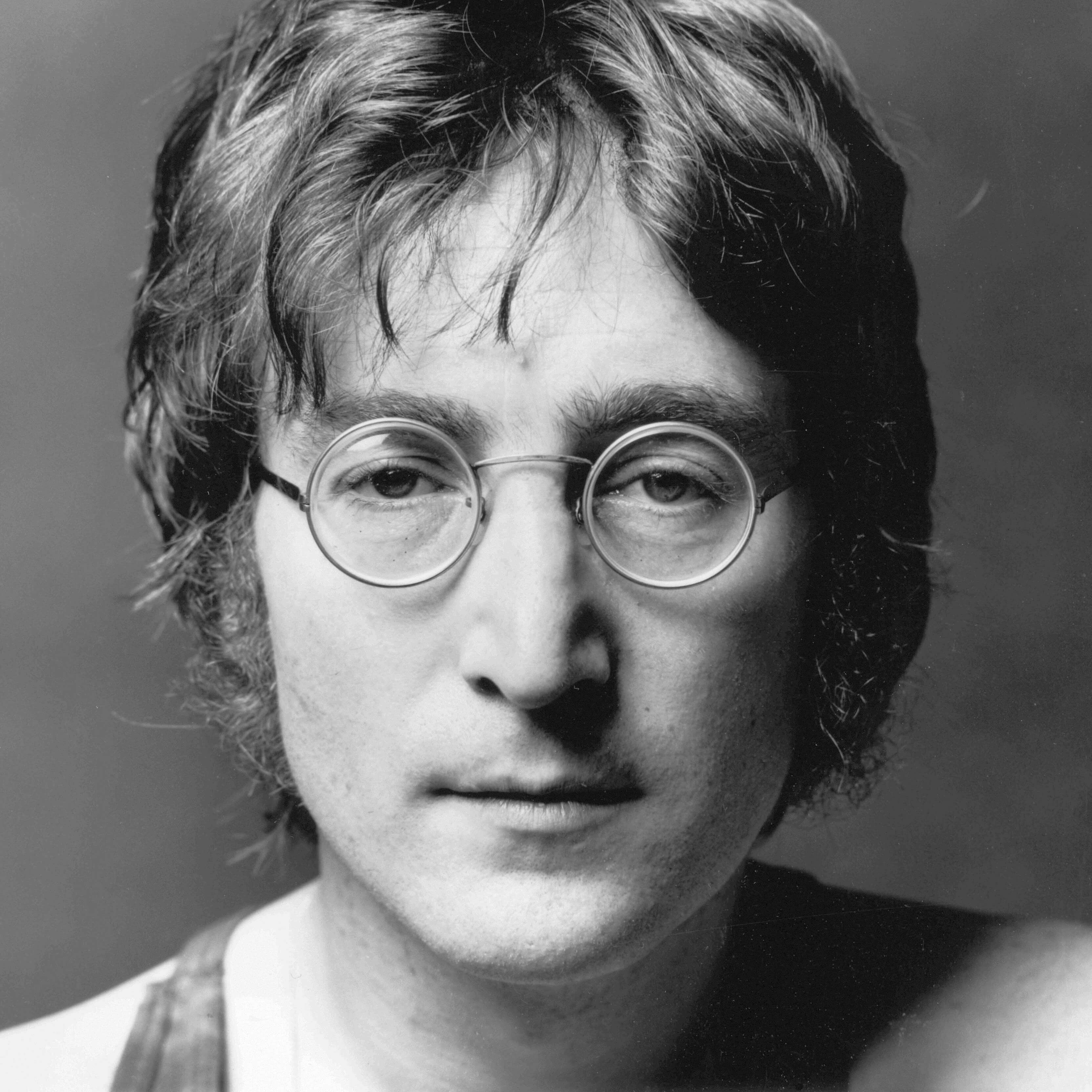 John Lennon Biography • Singer • Profile