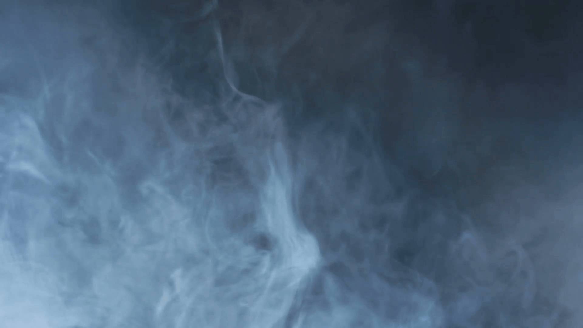 Smoke abstract. Smoke cloud. Smoke on black background in blue light