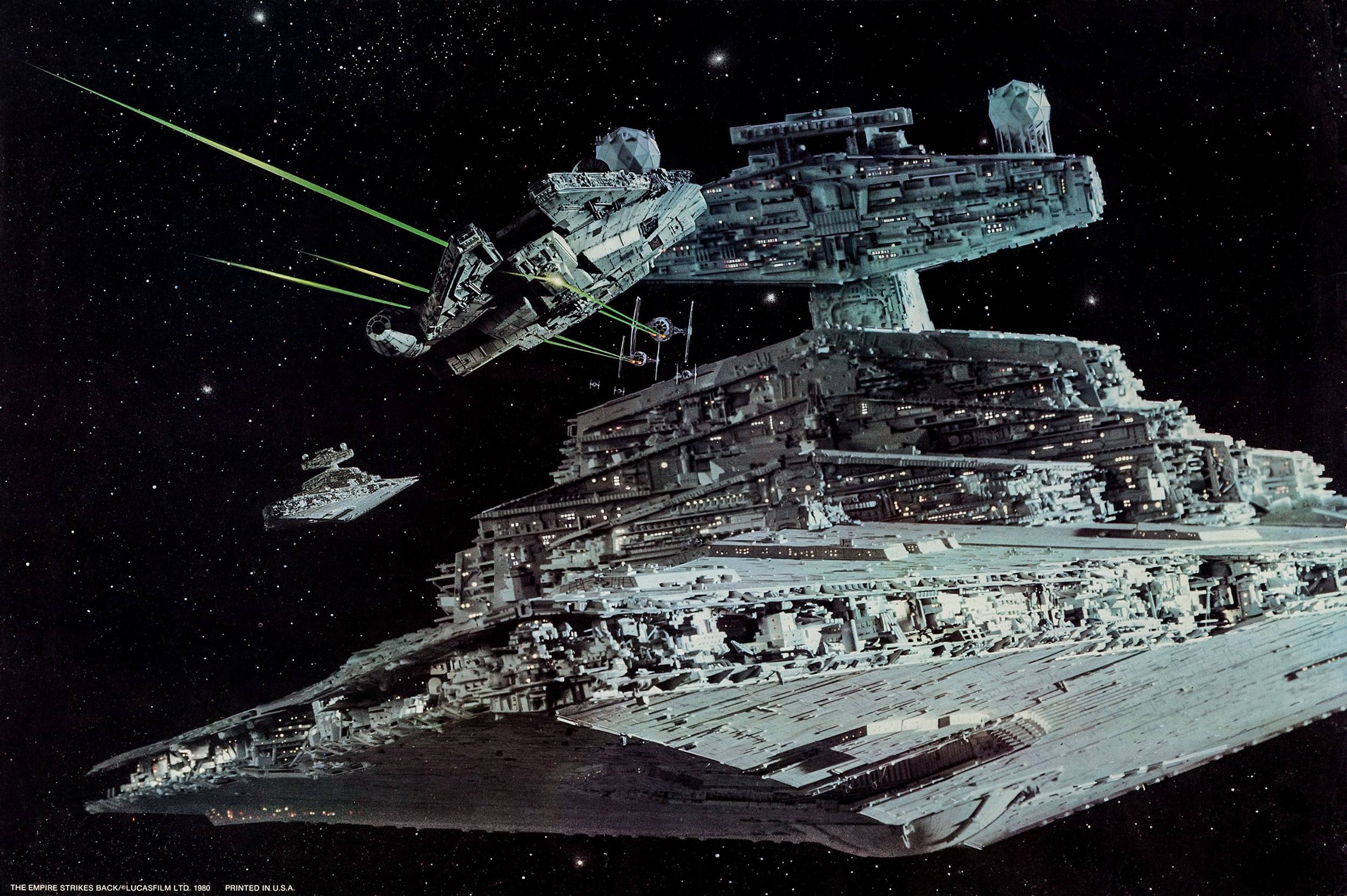 Classic image of the Millennium Falcon, Star Destroyers, and Tie