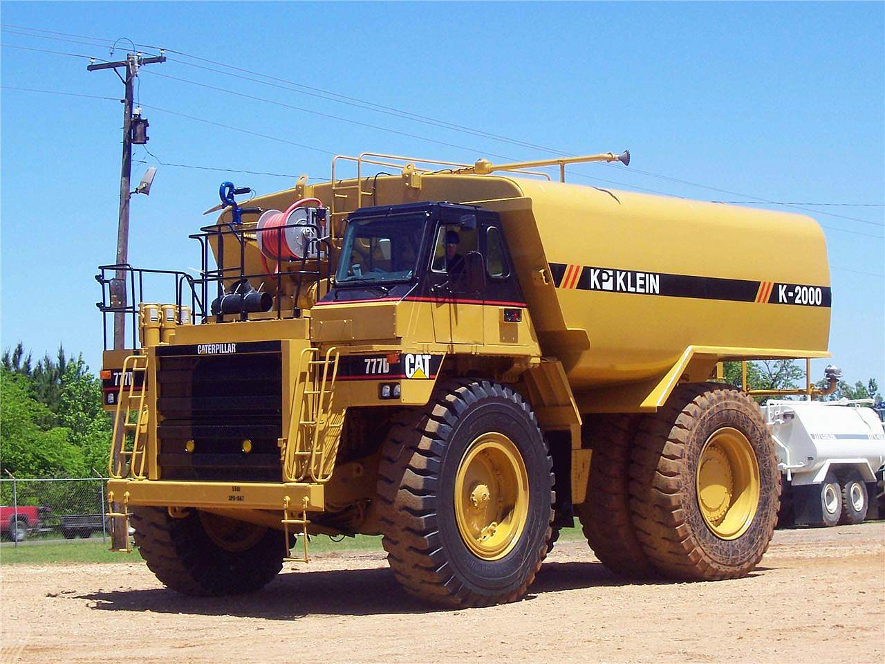 Сат авто. Caterpillar 777g. Самосвал Caterpillar 797в. Катерпиллер грузовик карьерный. Катерпиллер 777.