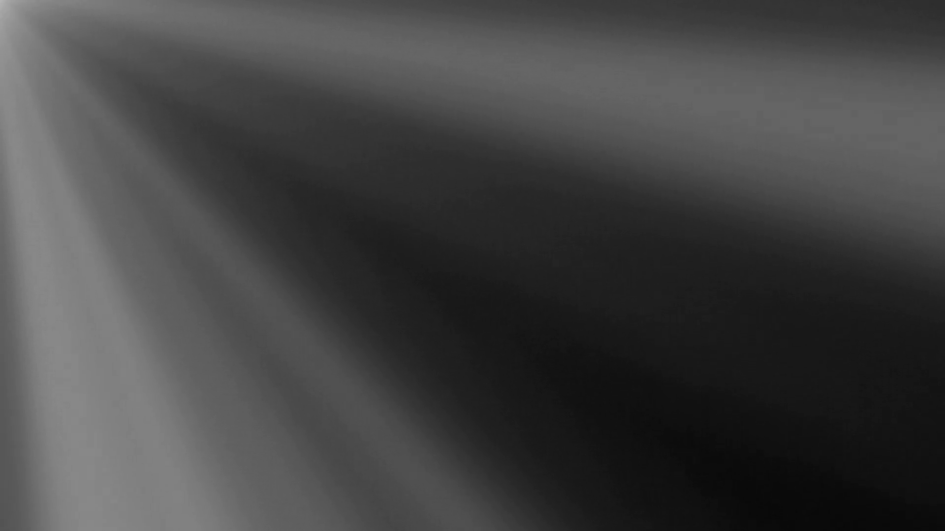 Looping clip of light rays on a black background. Animation created