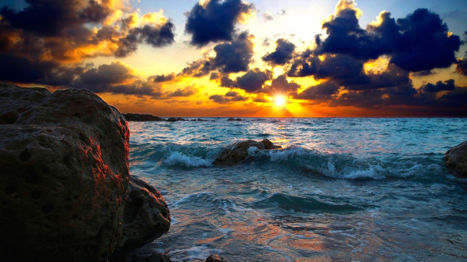 Download Wallpapers 1920x1080 Sea, Surf, Sunset, Stones Full HD 1080p