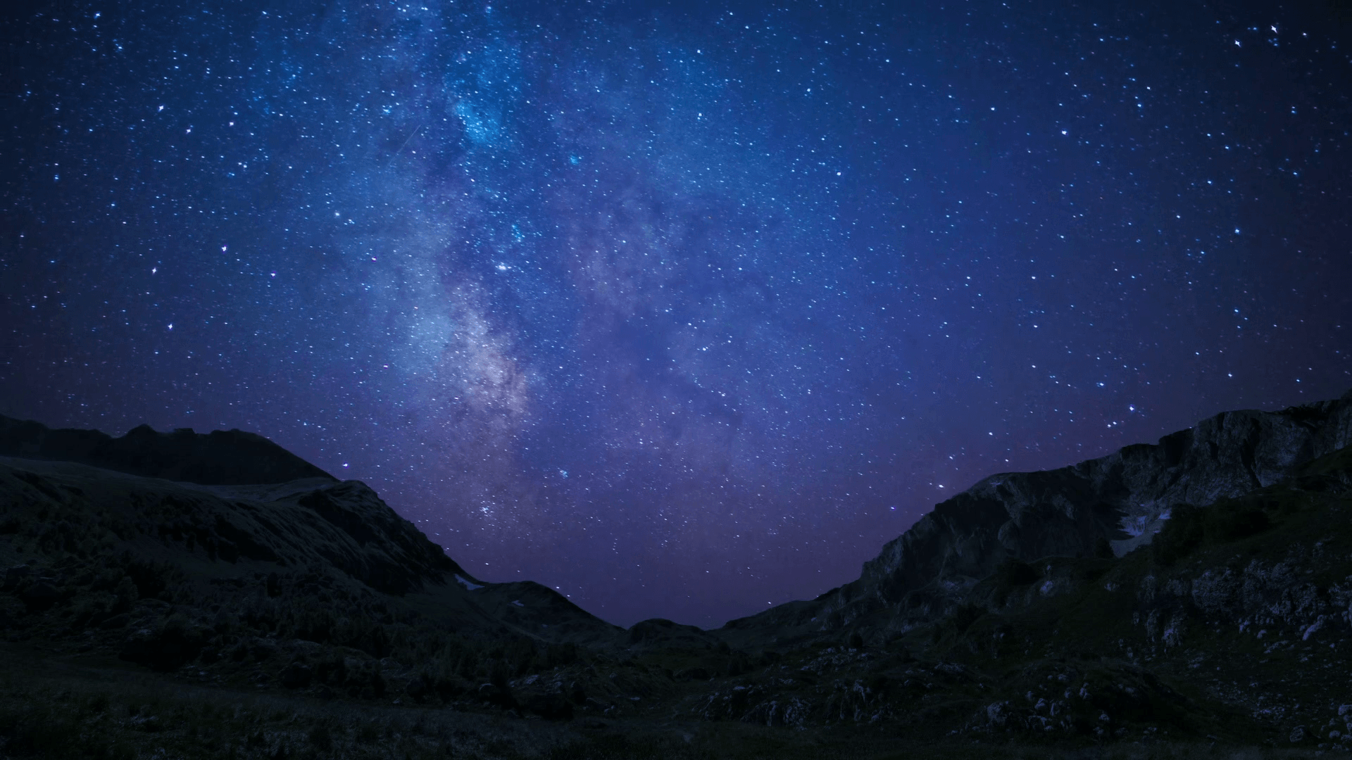 night sky stars milkyway on mountains background Stock Video Footage