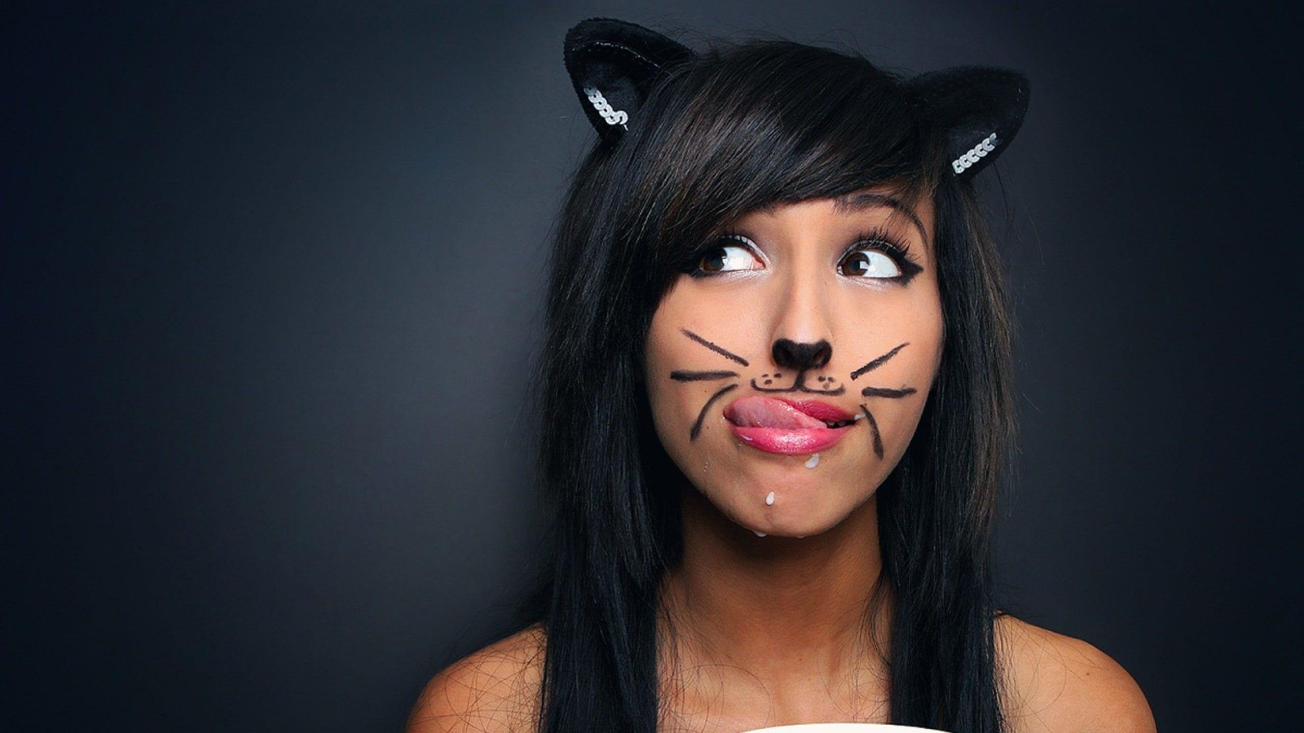 Woman in black hair and cat makeup HD wallpaper