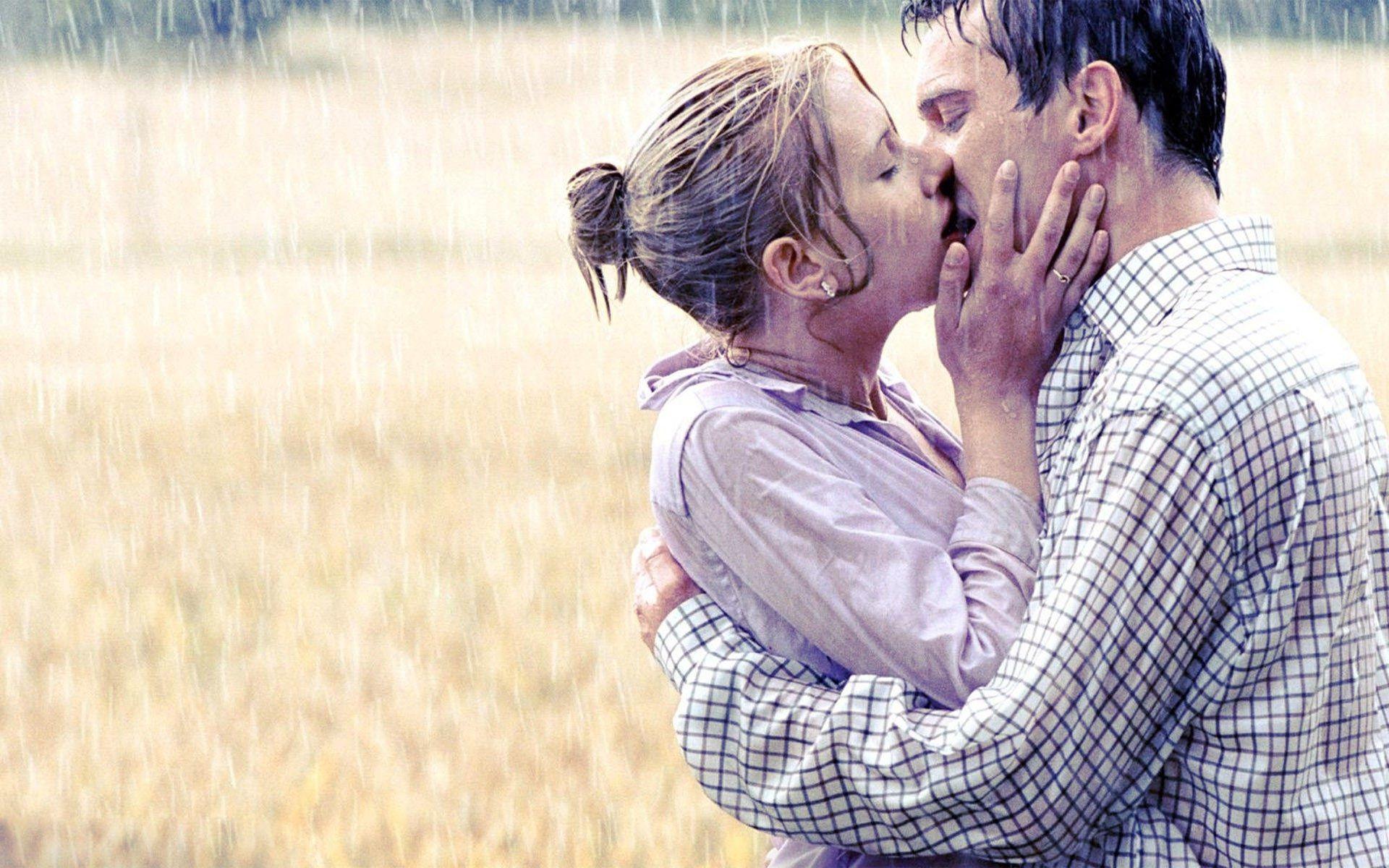 Hot kissing in rain romantic couple