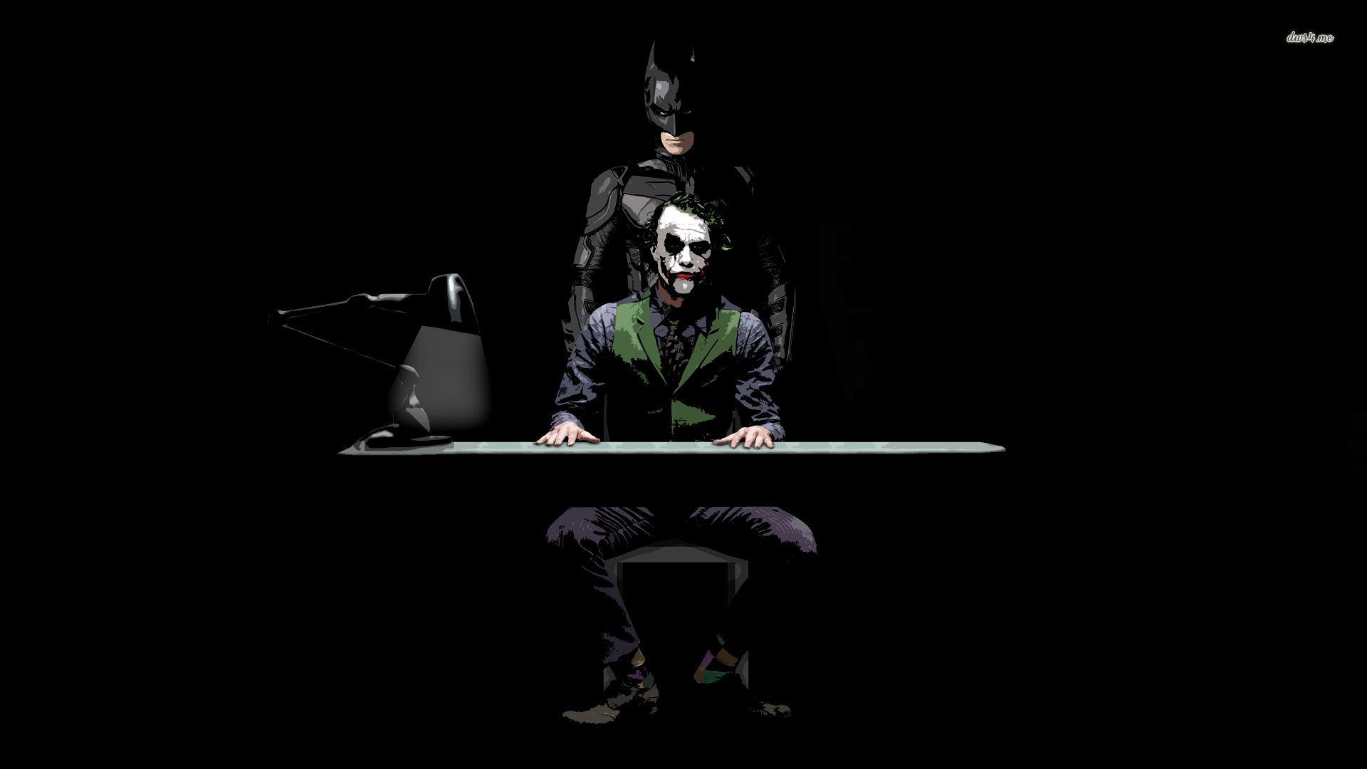 The Dark Knight and The Joker at the table wallpaper