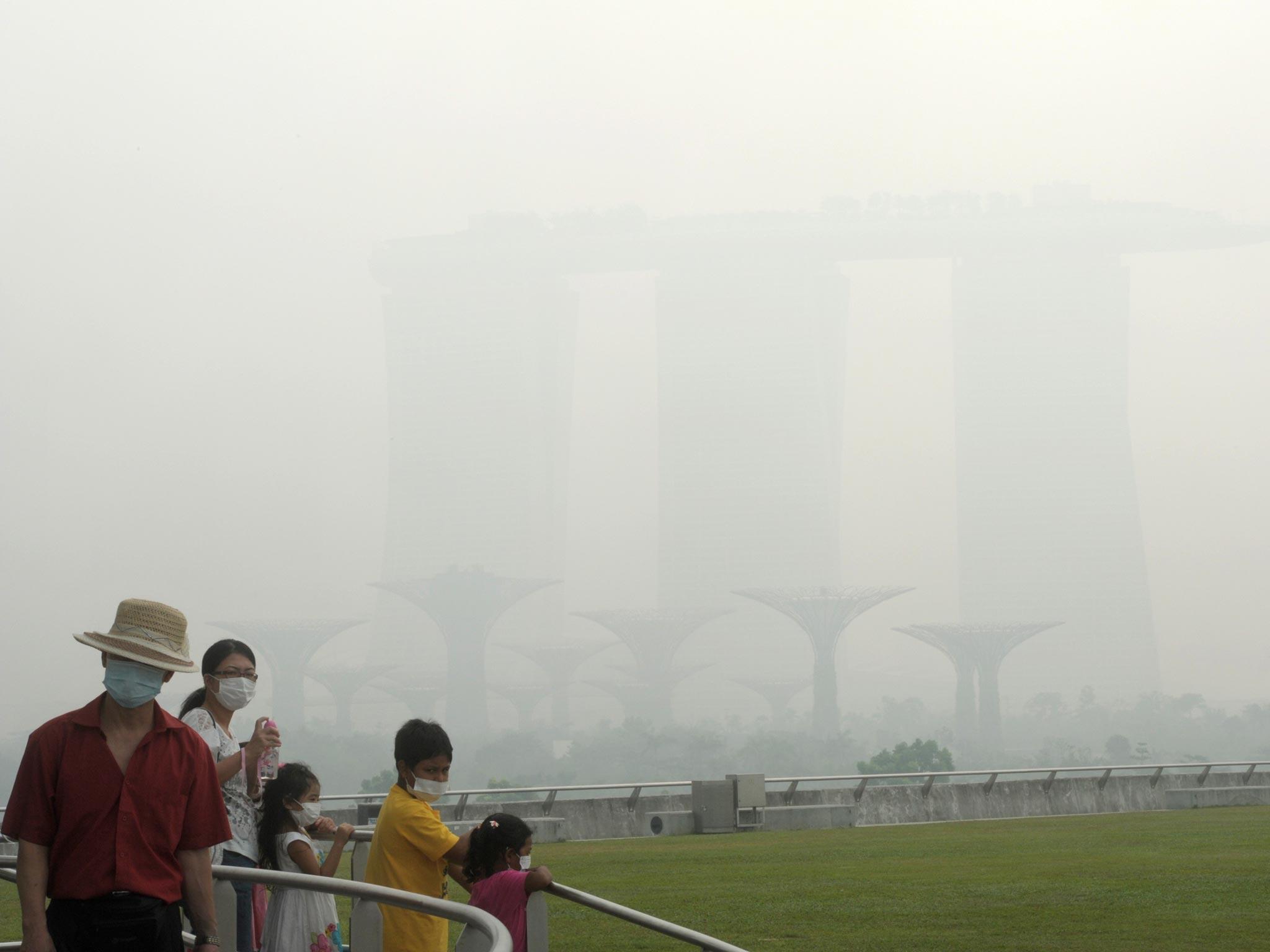 Singapore smog gets worse chemically induced rain clear