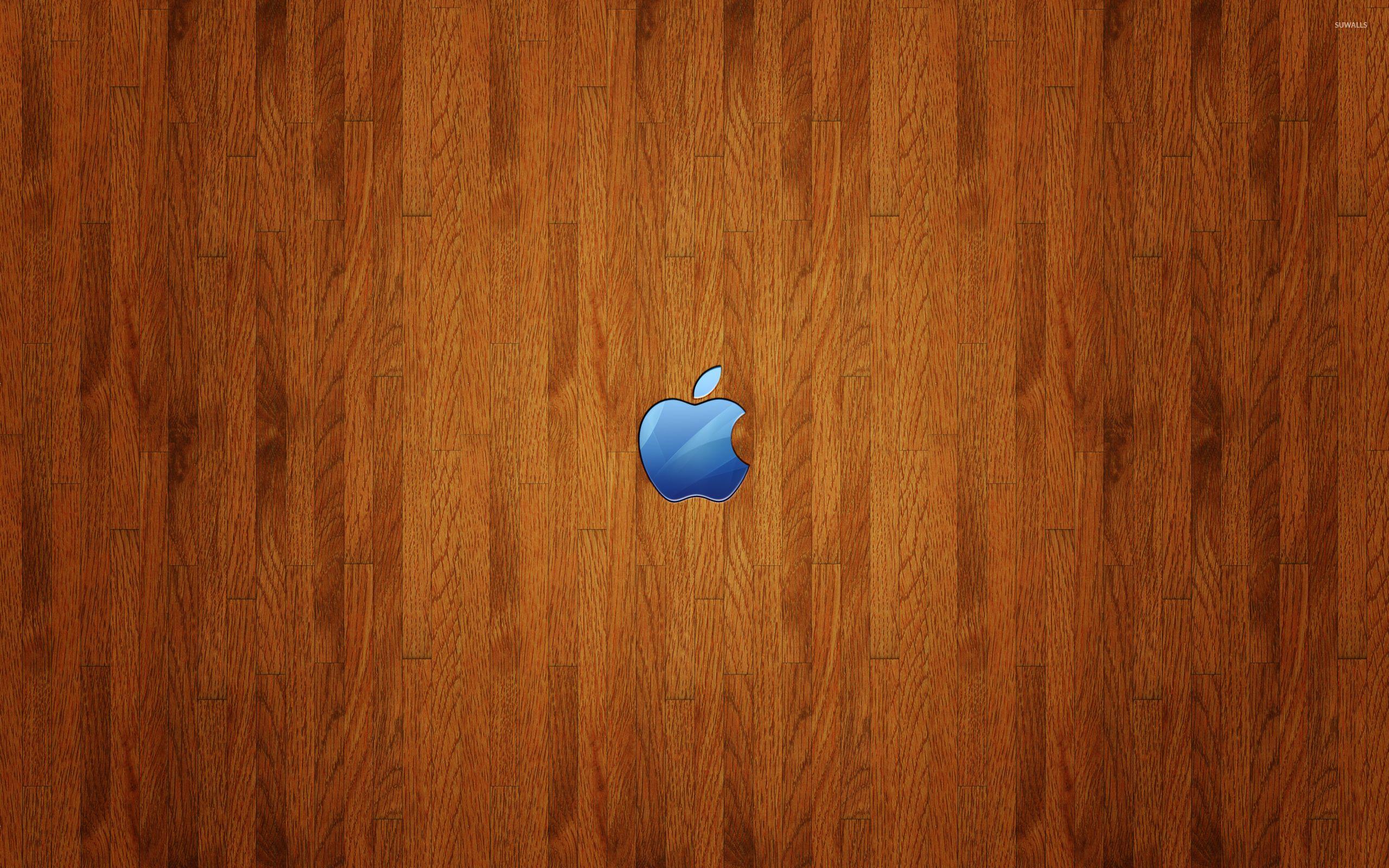 Blue Apple logo on wood wallpaper wallpaper