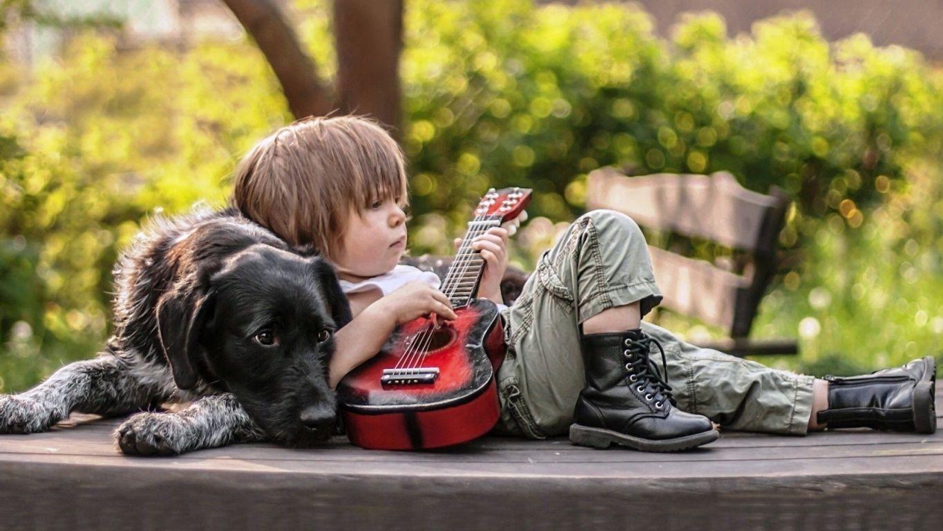 Cute boy playing guitar with dog HD wallpaper wallpaper Quality HD Desktop Wallpaper. Dogs, Cute wallpaper, Playing guitar