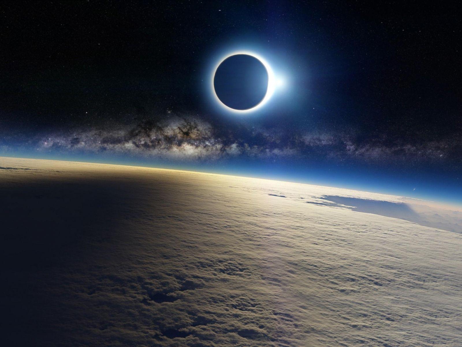 Download HD Solar Eclipse Moon Shadow On Earth Cloud Wallpaper