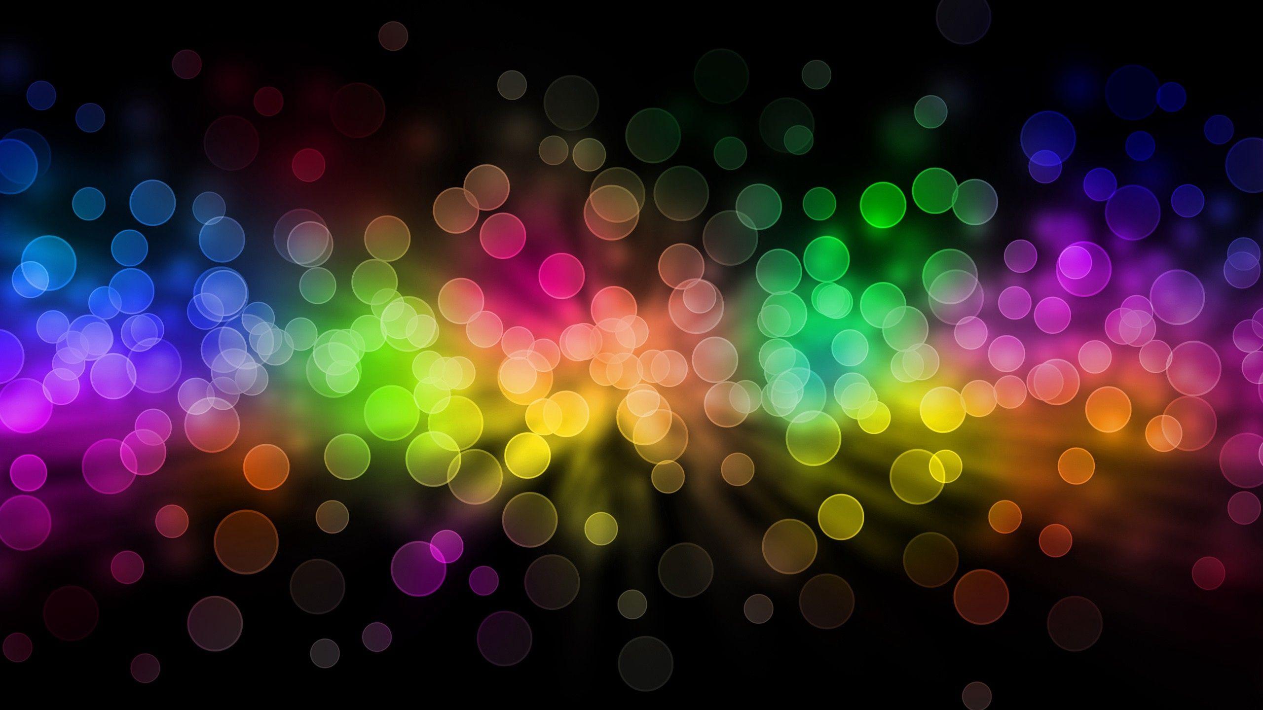 Download wallpaper 2560x1440 glare, rainbow, circles, background