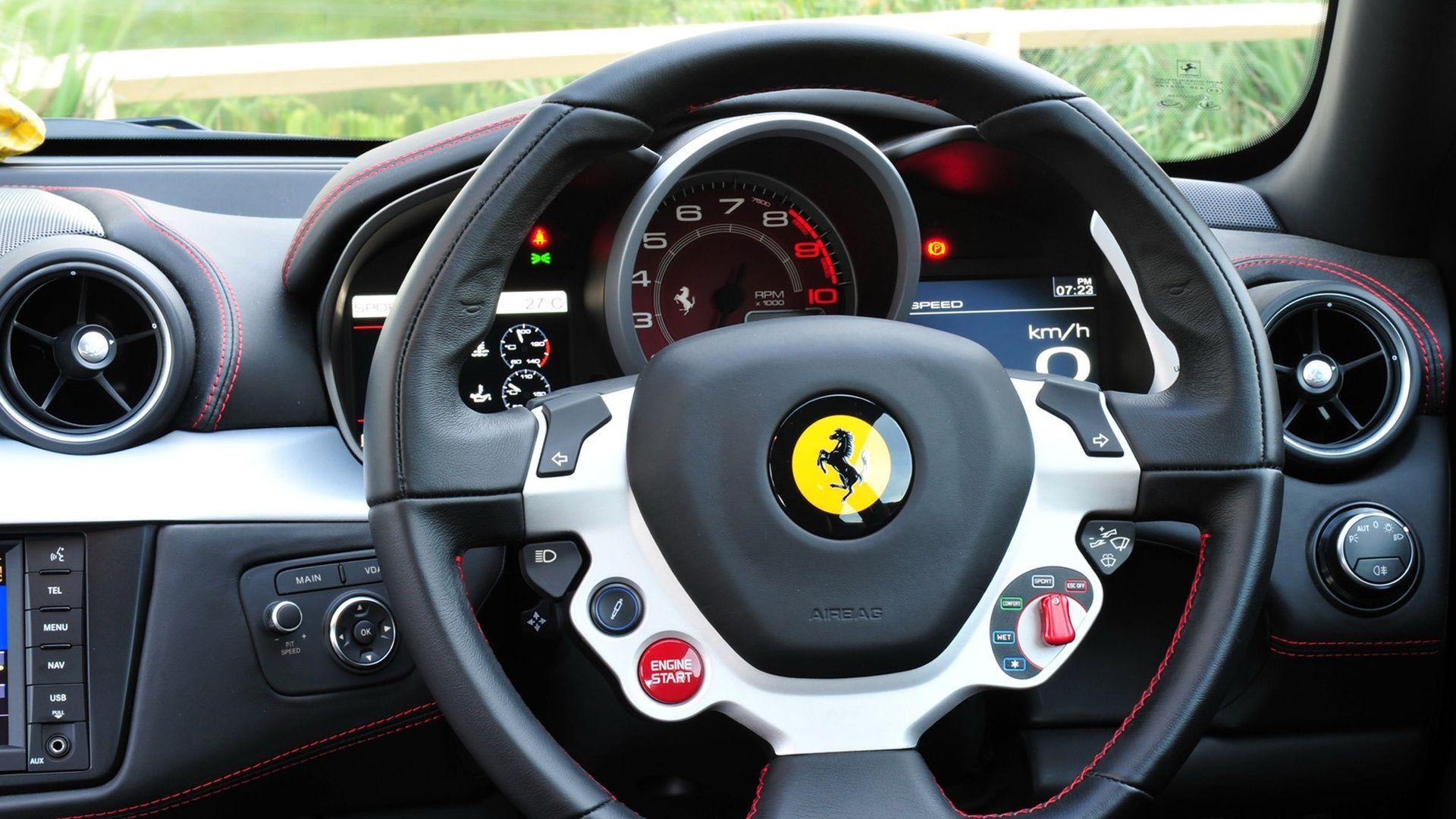 Ferrari FF dashboard on HD wallpaper background