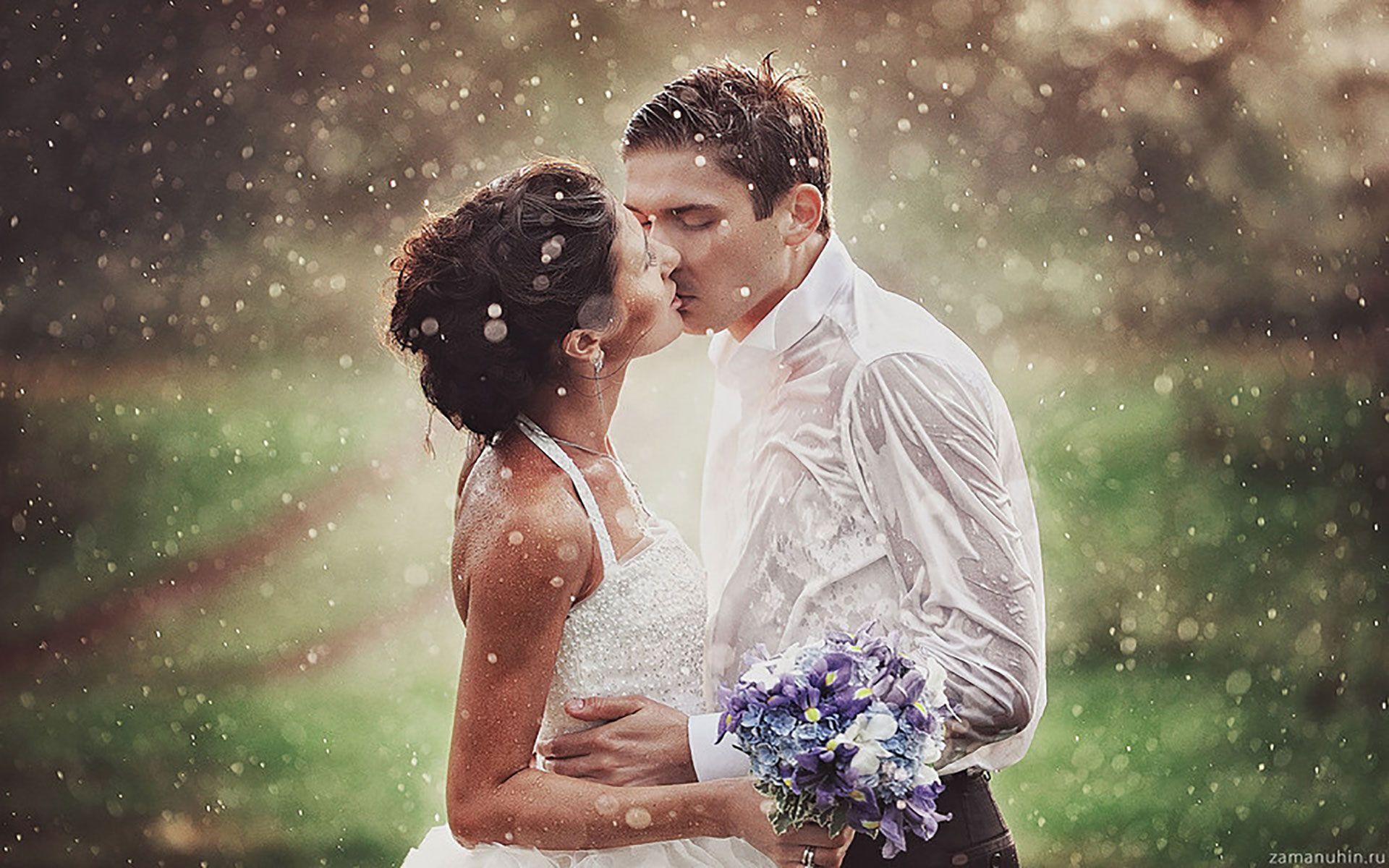 Passionate kiss of married couple in rain. Romantic & Sad Couple