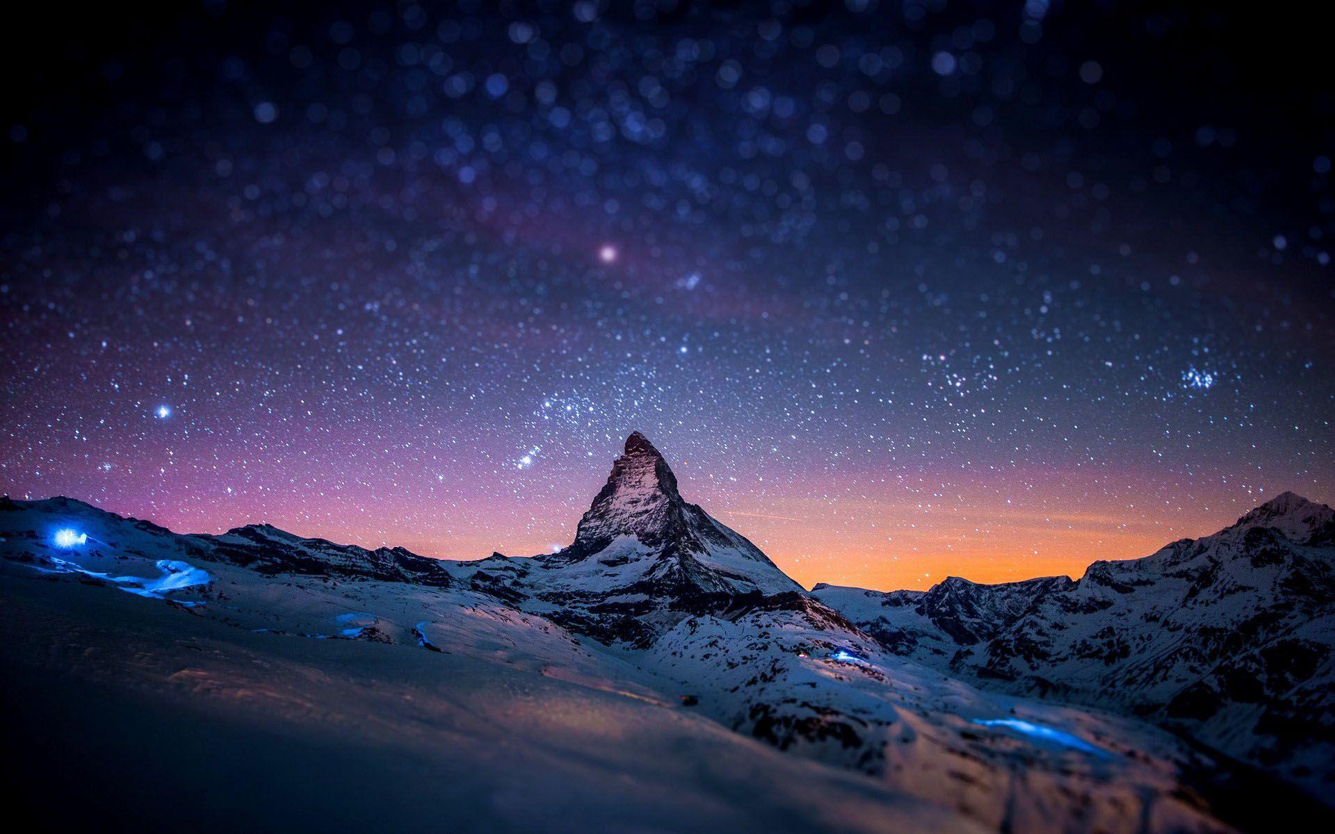 Mountain peak in starry night 1920x1200 wallpaper. Good Photo