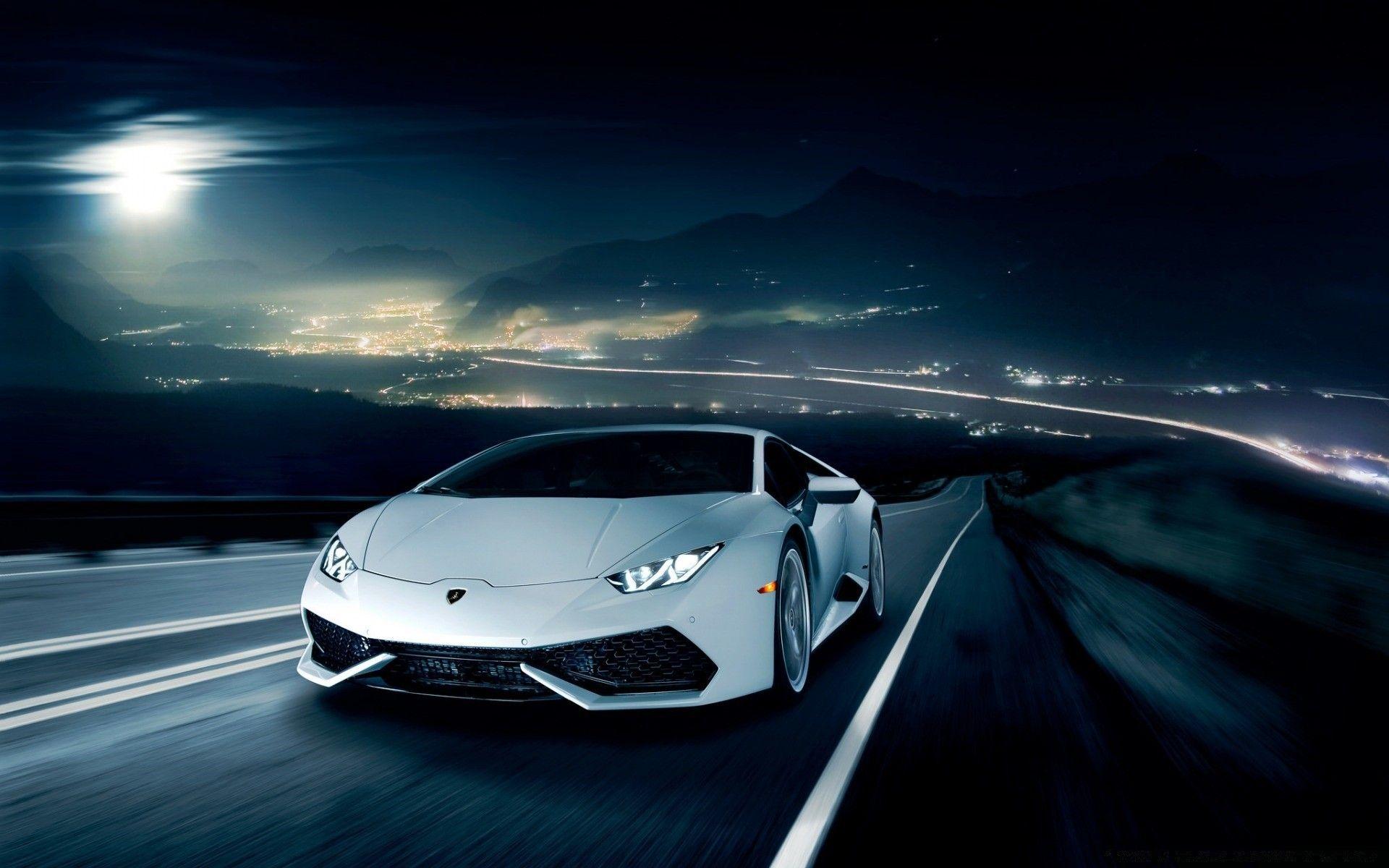 Lamborghini Huracan on the Road at Night. iPhone wallpaper for free