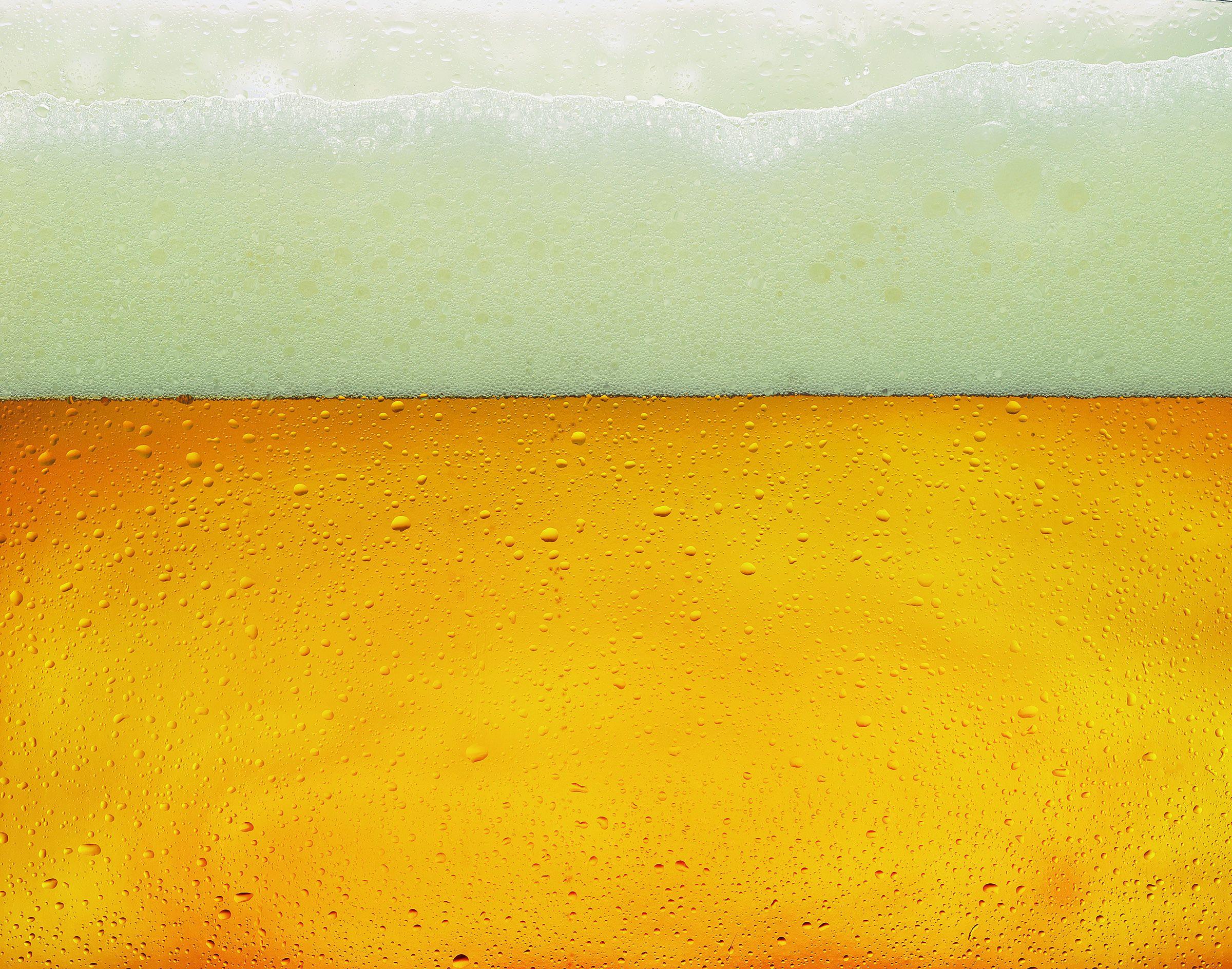 Beer Liquid with Foam. Photo Texture & Background
