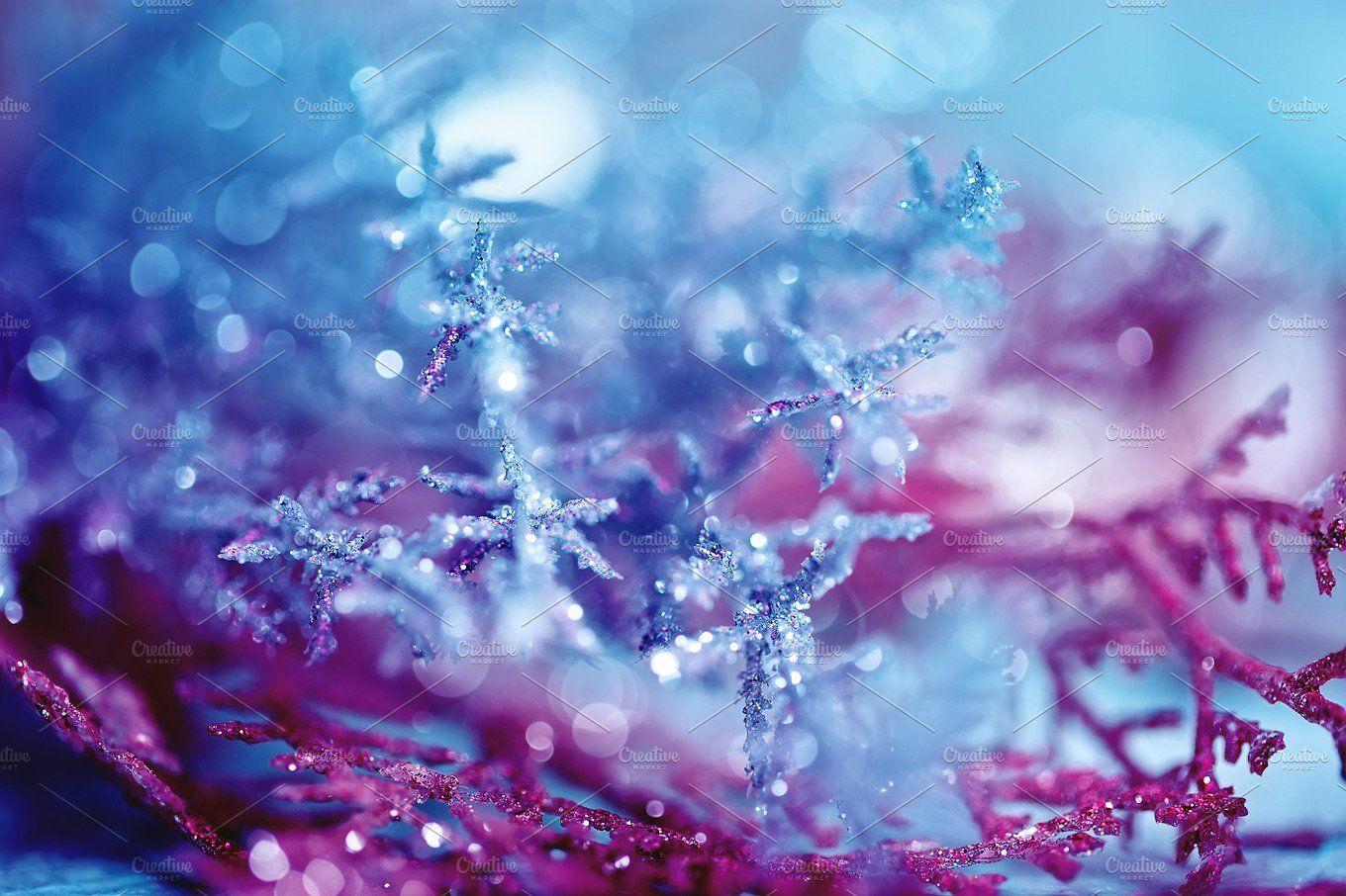 blue pink bokeh abstract light snowflake background Holiday