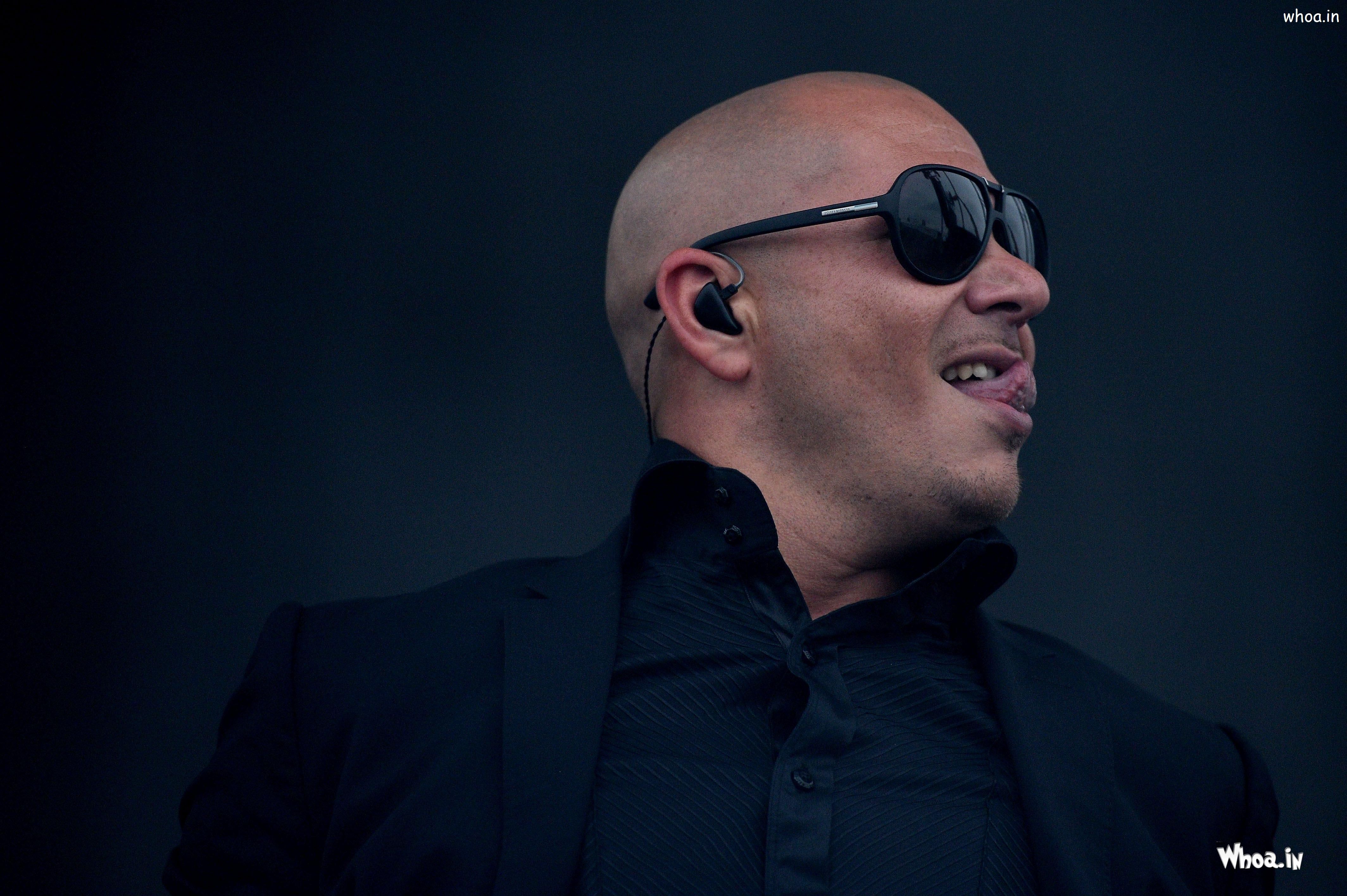 Pitbull Black Suit And Black Sunglass With Dark Background