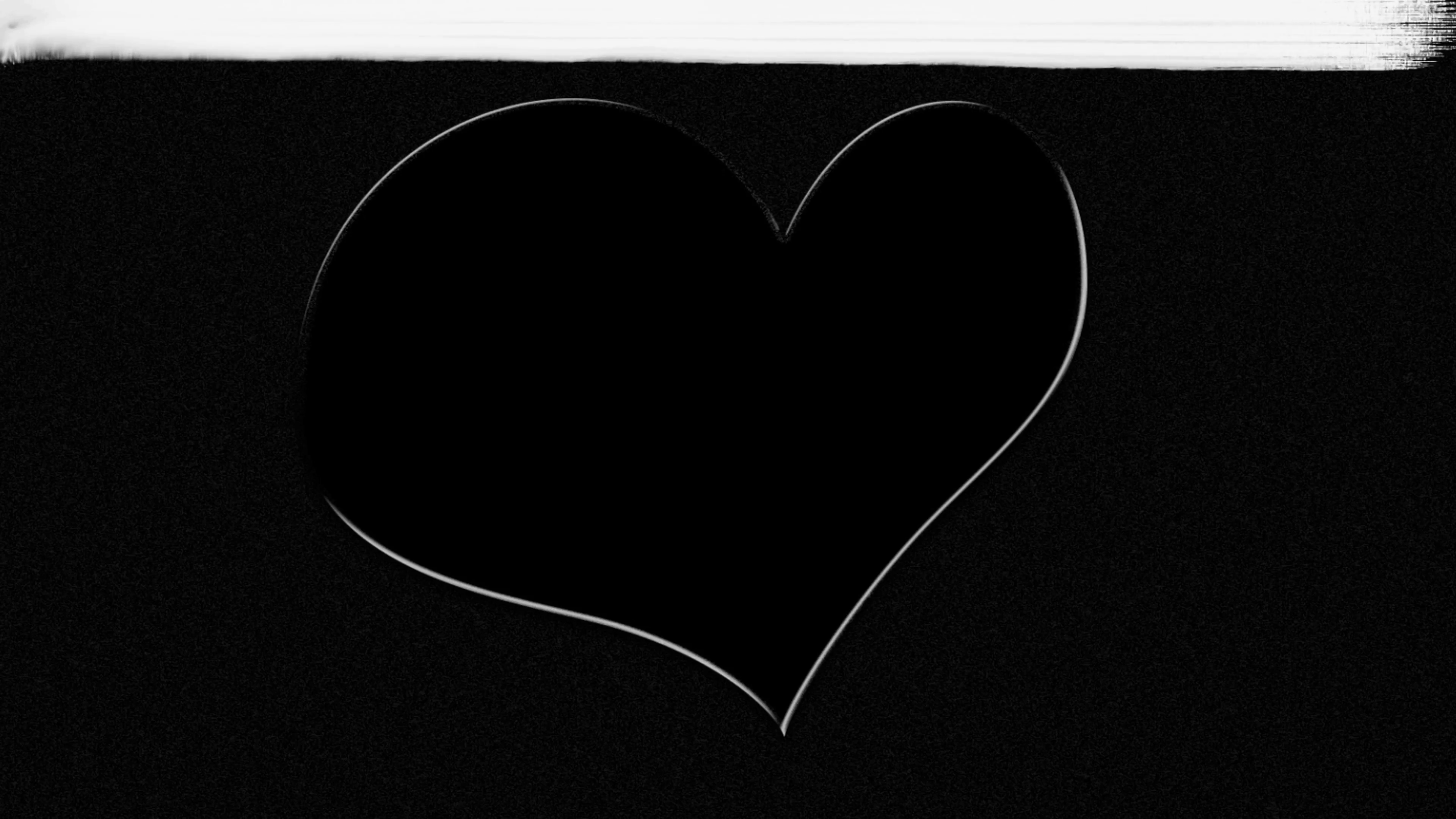Hand drawn white heart on black background painted over with white